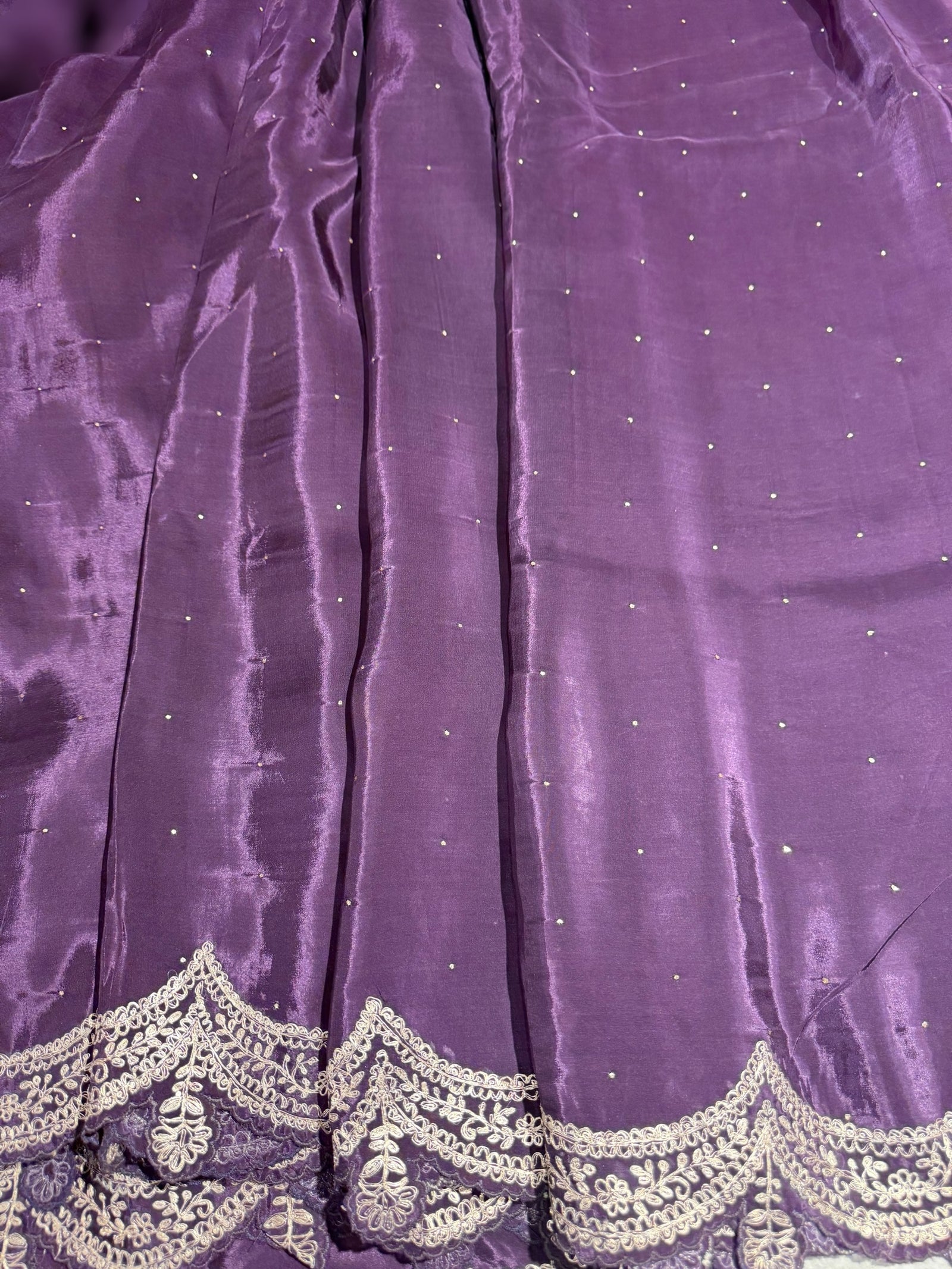 Plum crepe silk saree with scalloped pita border