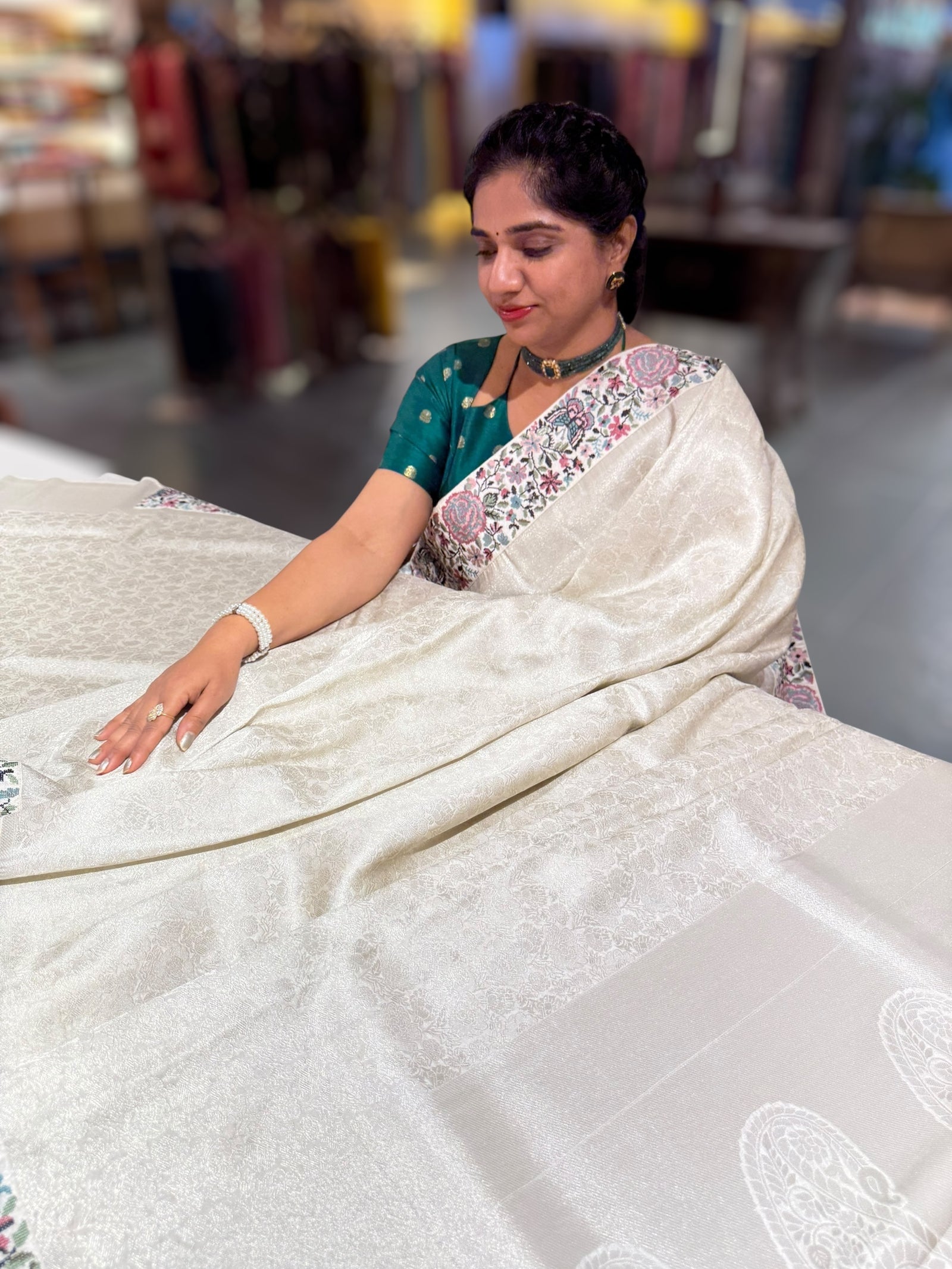 Half White Banarasi brocade Silk Saree with Petite Point Embroidered Border.