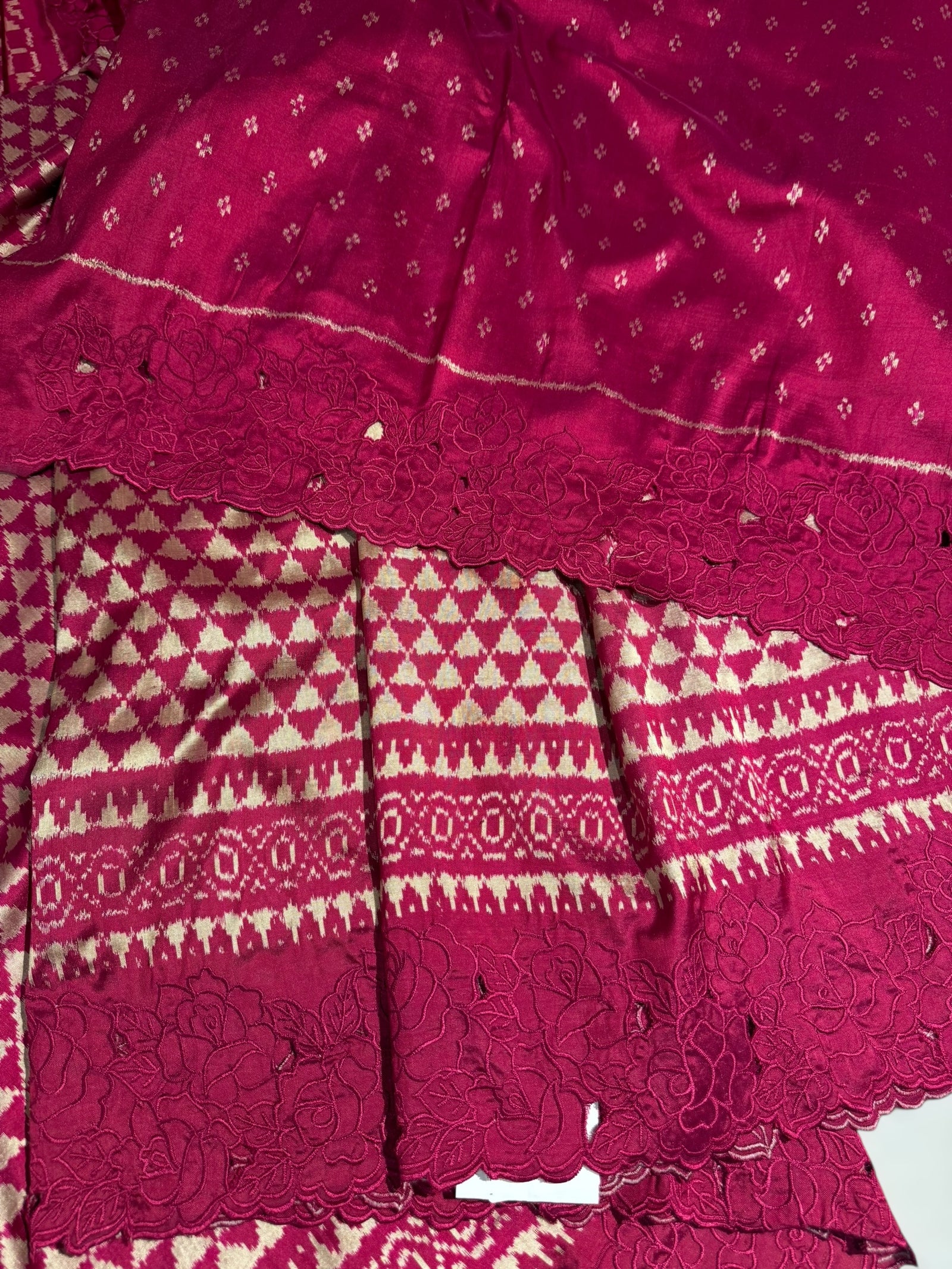 Ruby pink Cambodian–inspired Ikkat Silk Saree with cutwork Rose Border