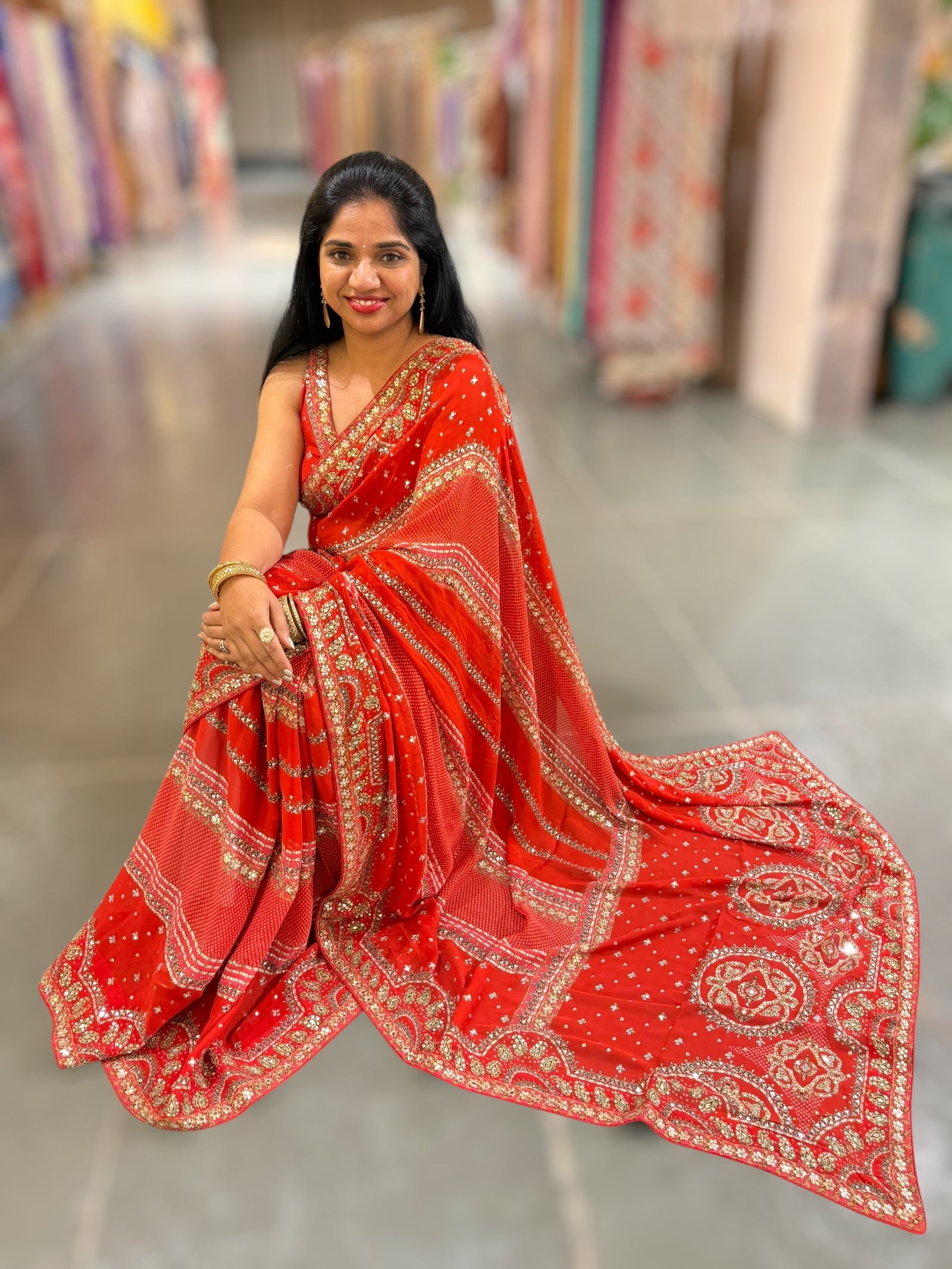 Orangish Red Kareena Inspired Gorgette Saree with allover mirrors