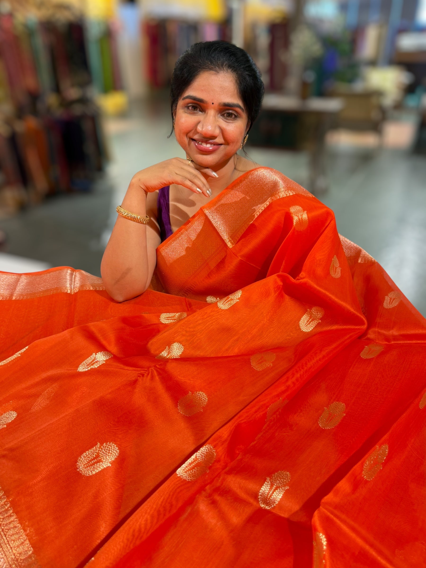 Orange Premium Kora Banarasi Saree with heavy weaving borders and Raw mango style motifs