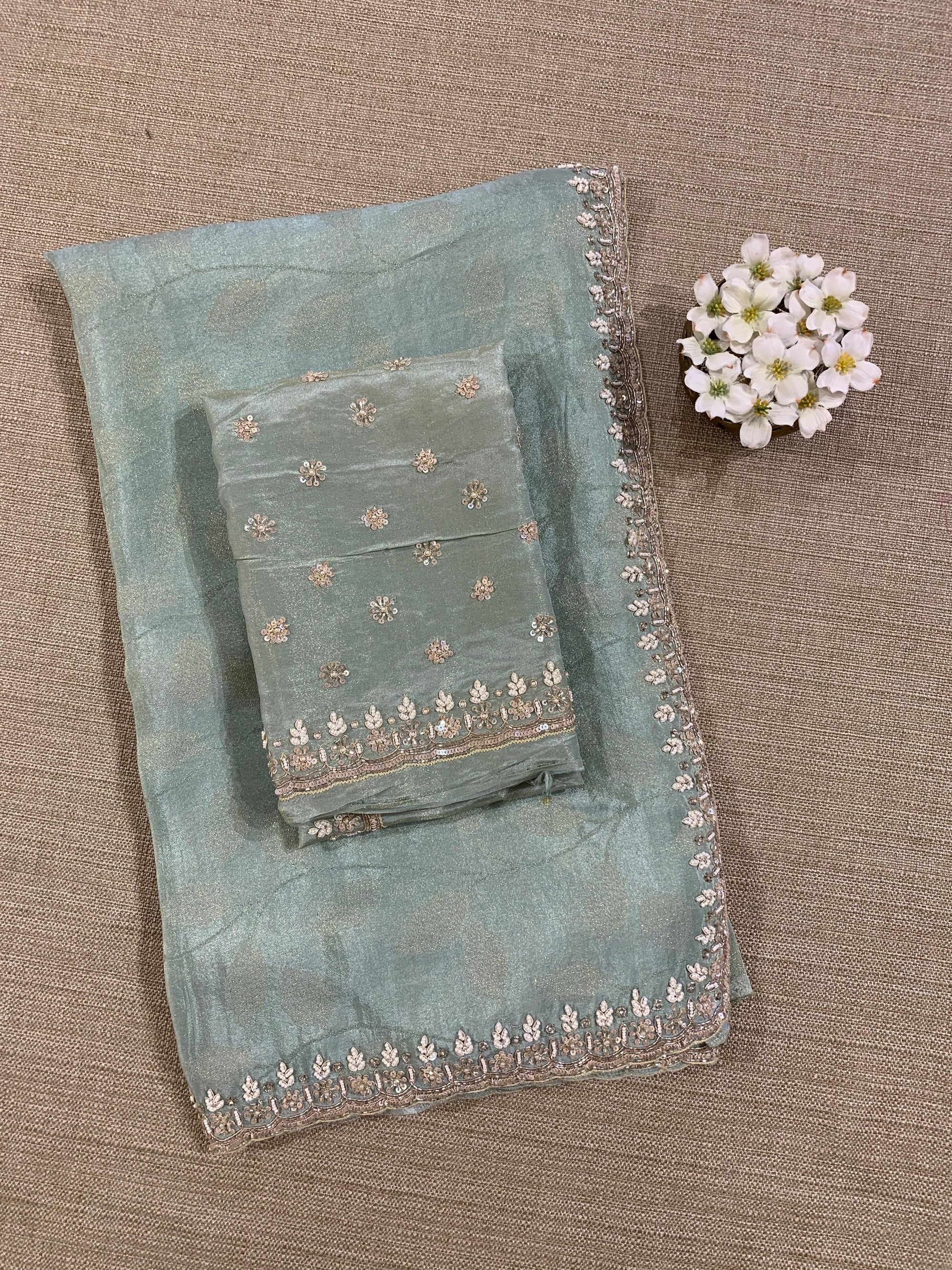 Pastel Blue Tissue Gorgette Saree With Hanwork Border and Blouse.