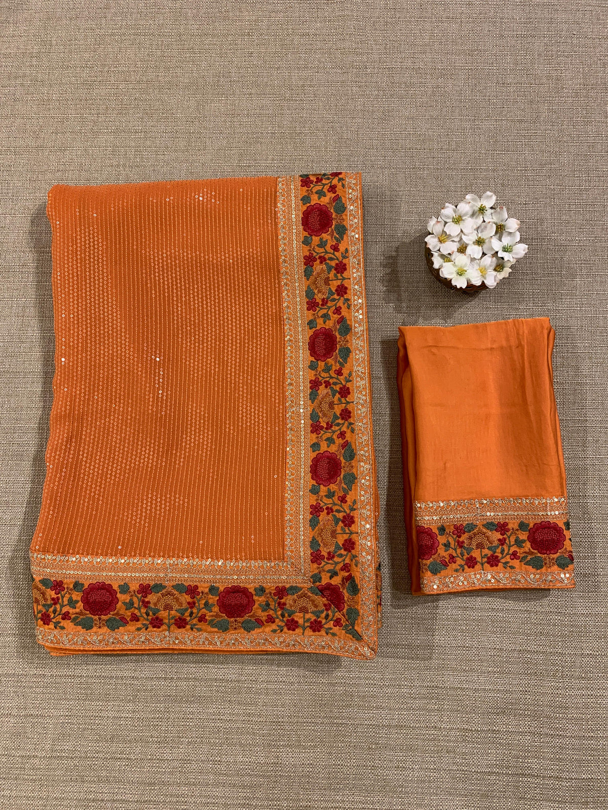 Orange Georgette sequnce Saree with Sabyasachi borders