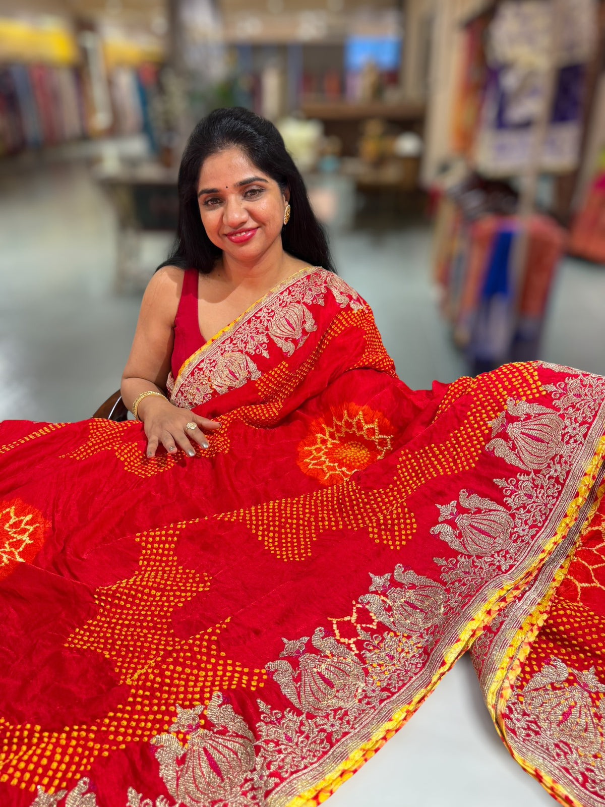 Reddish Orange Designer Rai Bandhej Saree With Embroidered Border