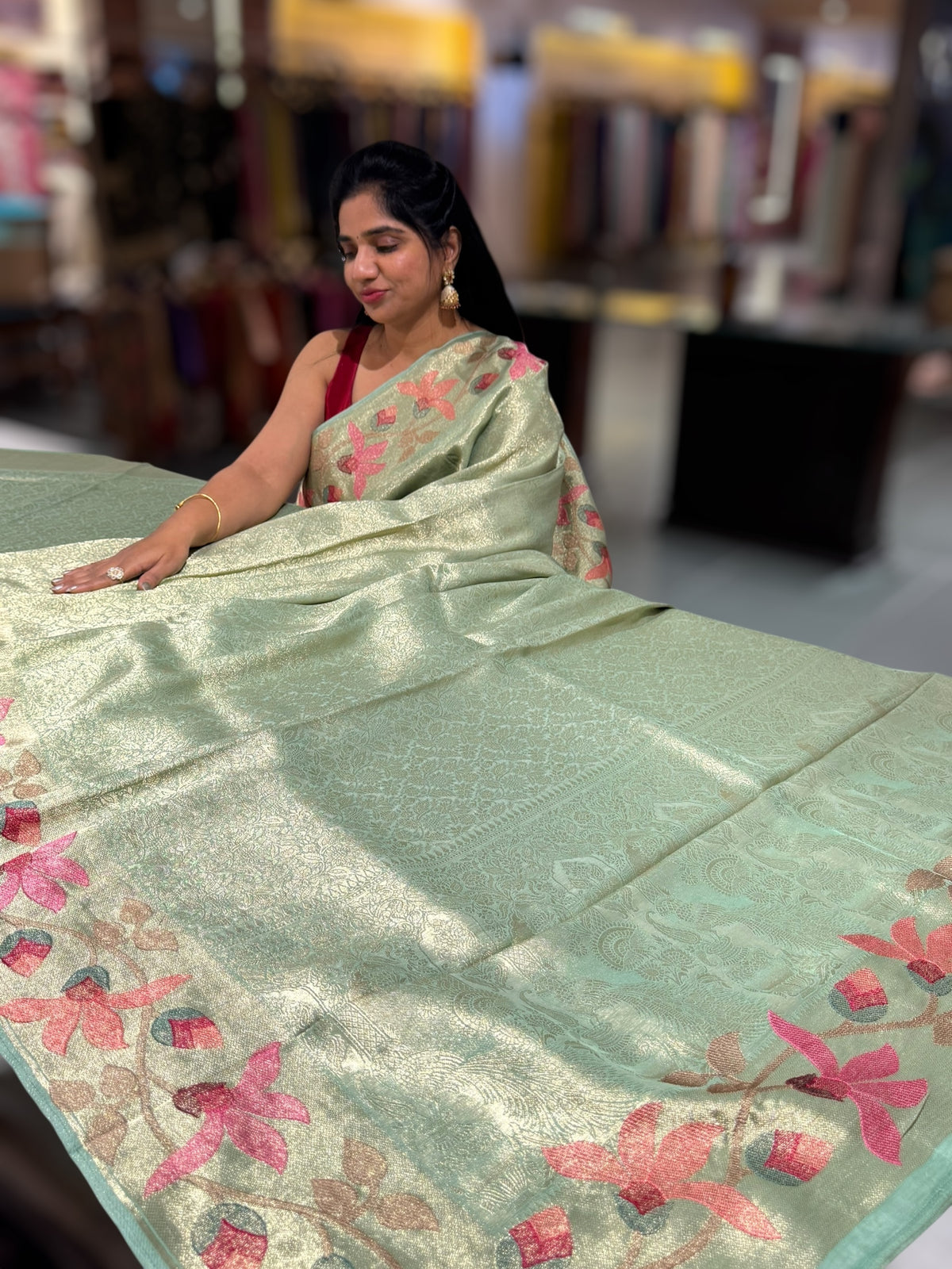 Mint Banarasi Brocade tissue saree with tonchui style weaving & pythani inspired embroidered border
