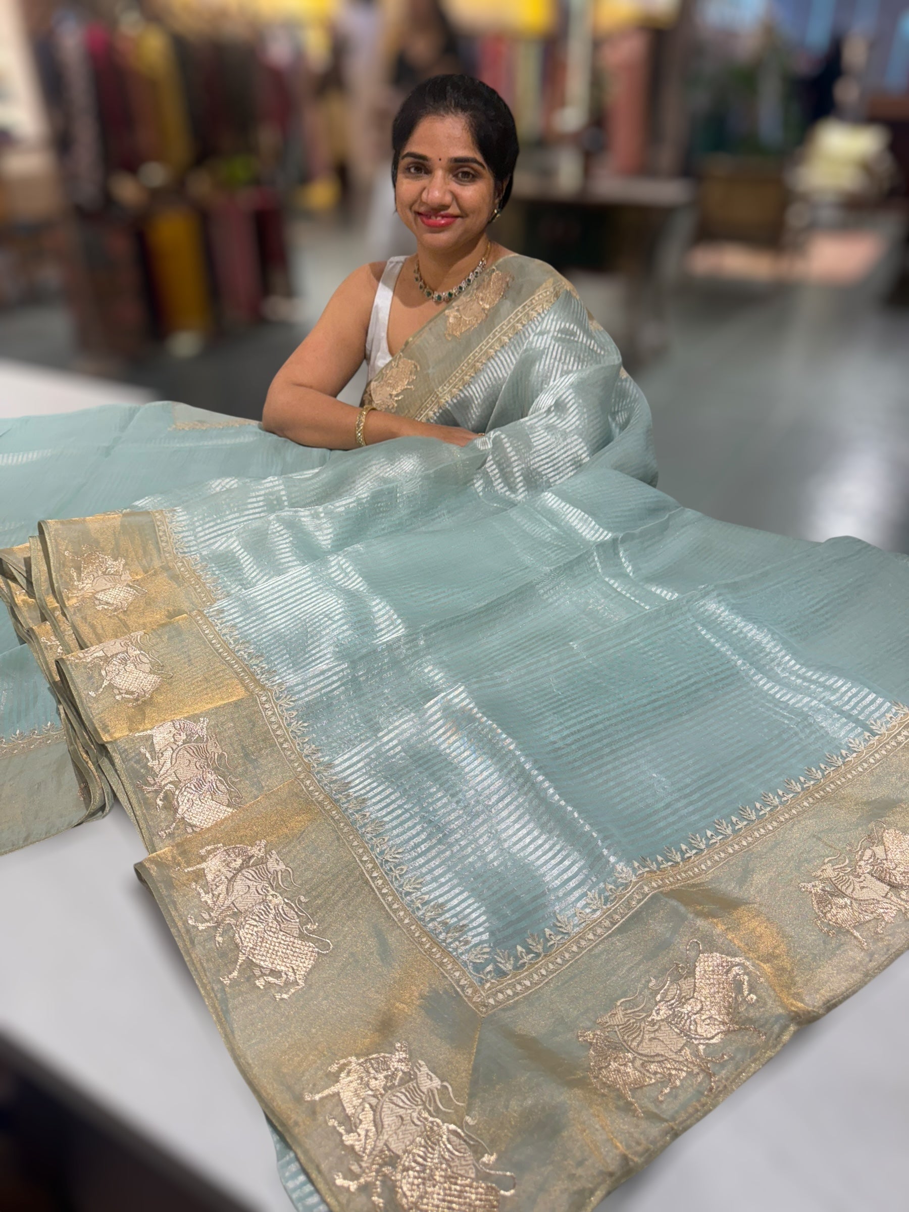 Pastel Blue Kora tissue stripes Saree with Nandi embroidered tissue border