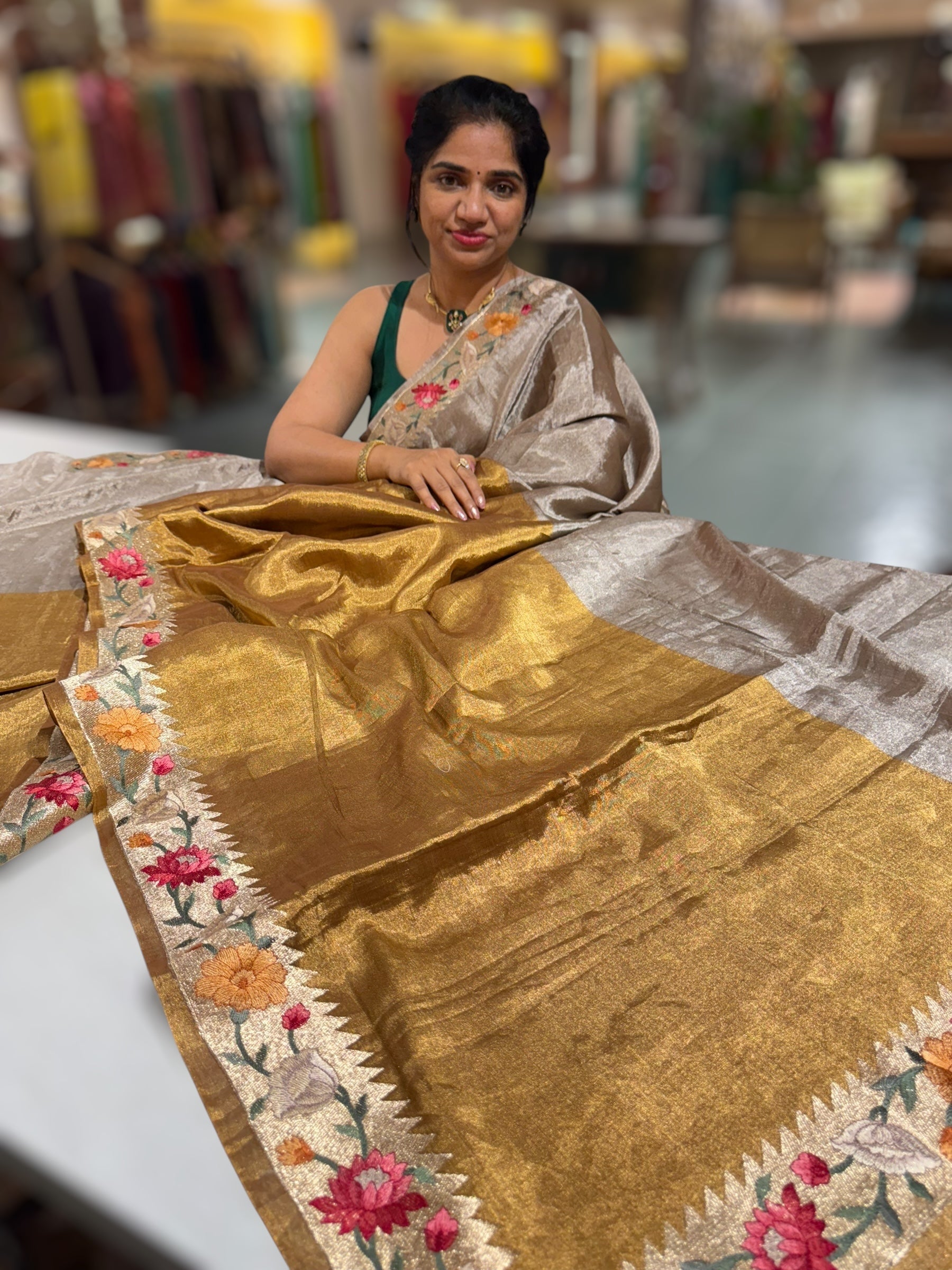 Handloom Tissue Saree with Paithani inspired embroidered border.