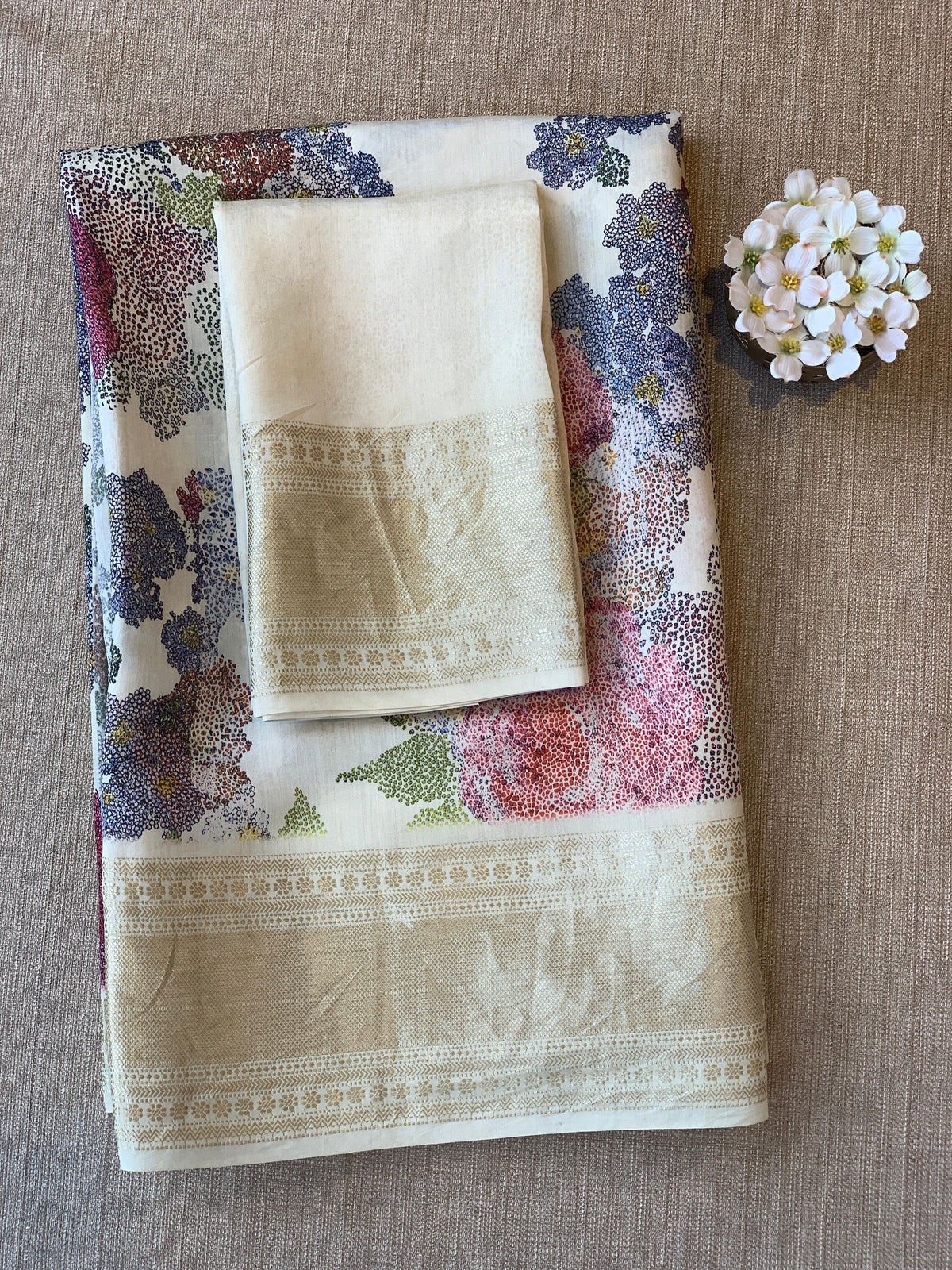 Ivory Pure Handloom Chiniya Silk Saree with stunning 3D Floral Print and zari borders
