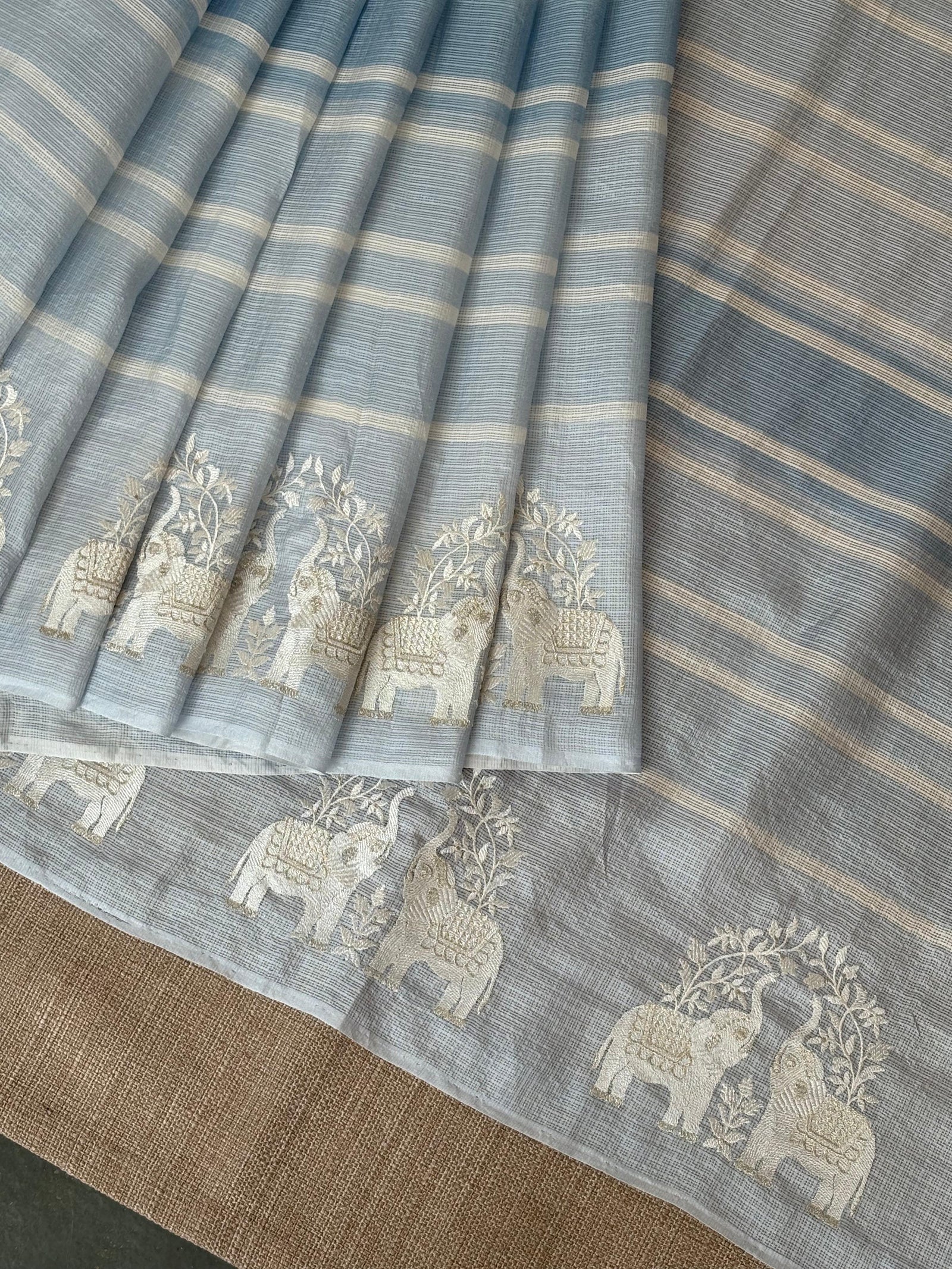 Dusty Blue Designer Silk kota saree with elephant embroidered border
