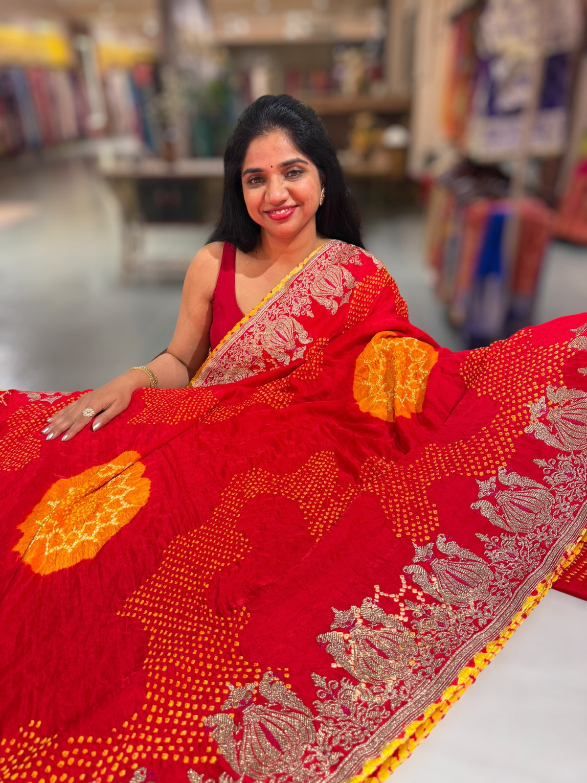 Orangish Red Designer Rai Bandhej Saree With Embroidered Border