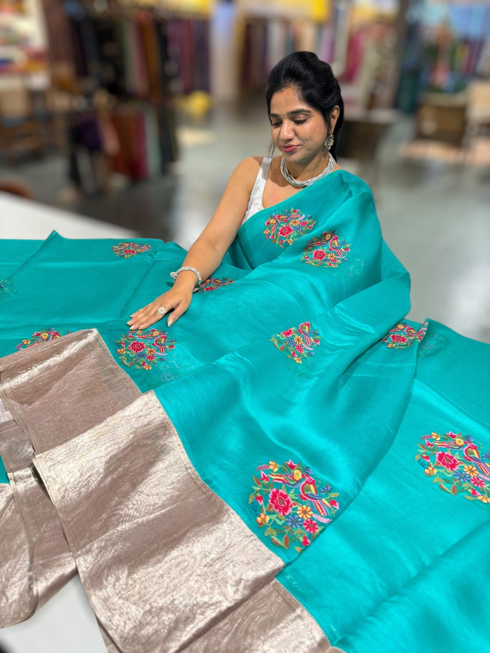 Teal Organza Saree with pure Tissue Border