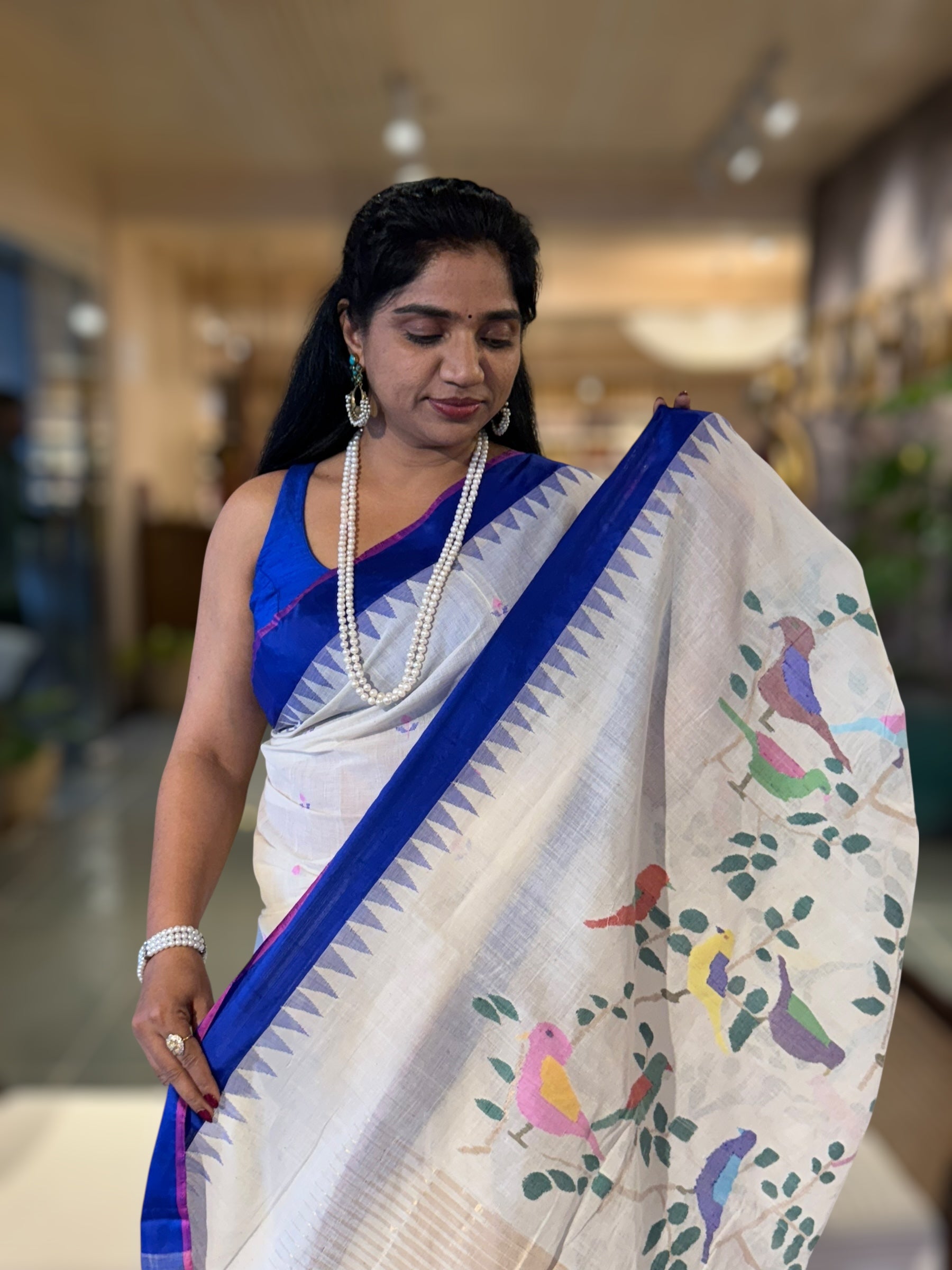 Ivory Ponduru Khadi Saree with Royal Blue Temple Border & Jamdani Bird Pallu