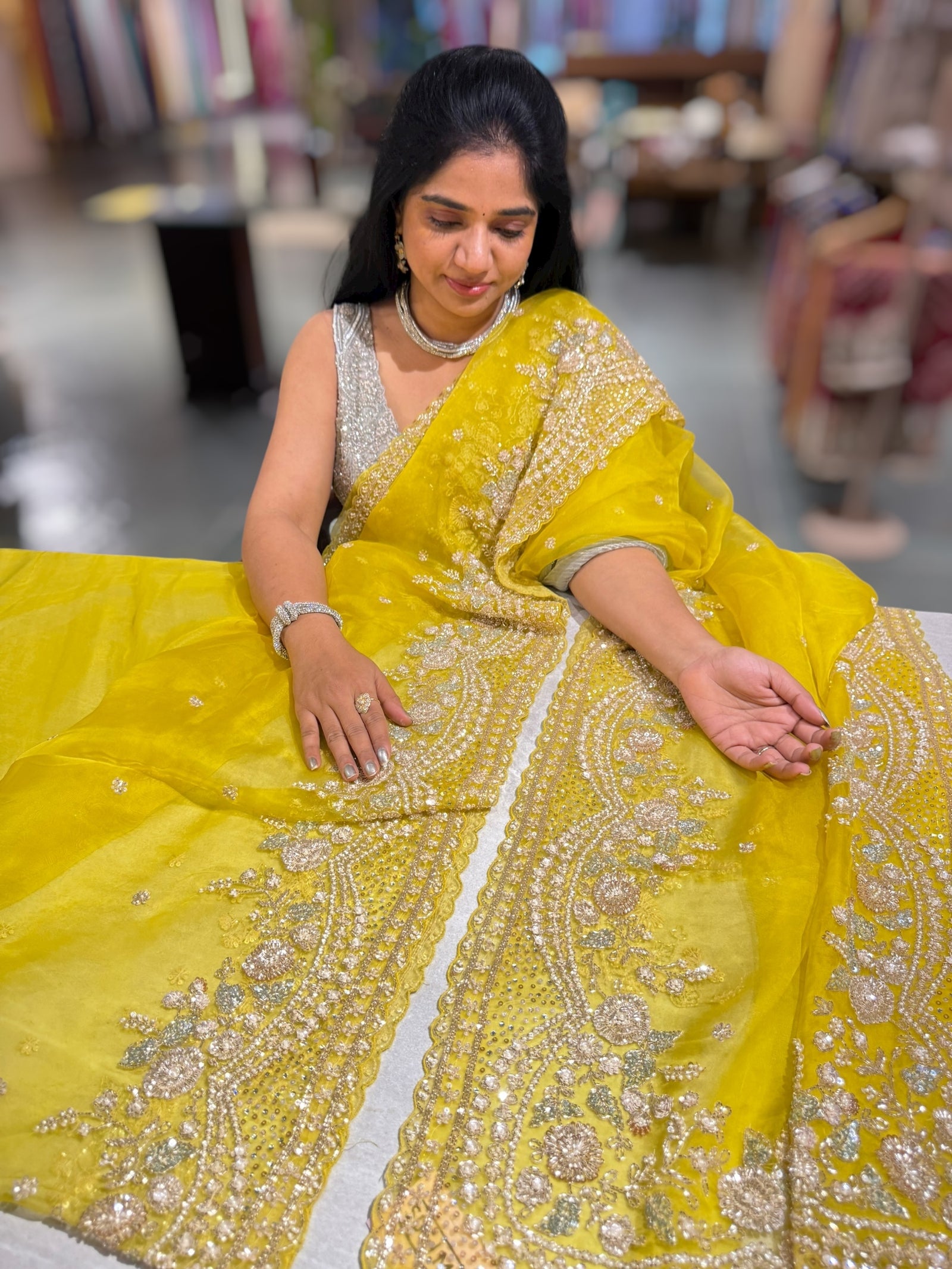 Lemon Yellow Organza Silk Saree with heavy intricate handwork