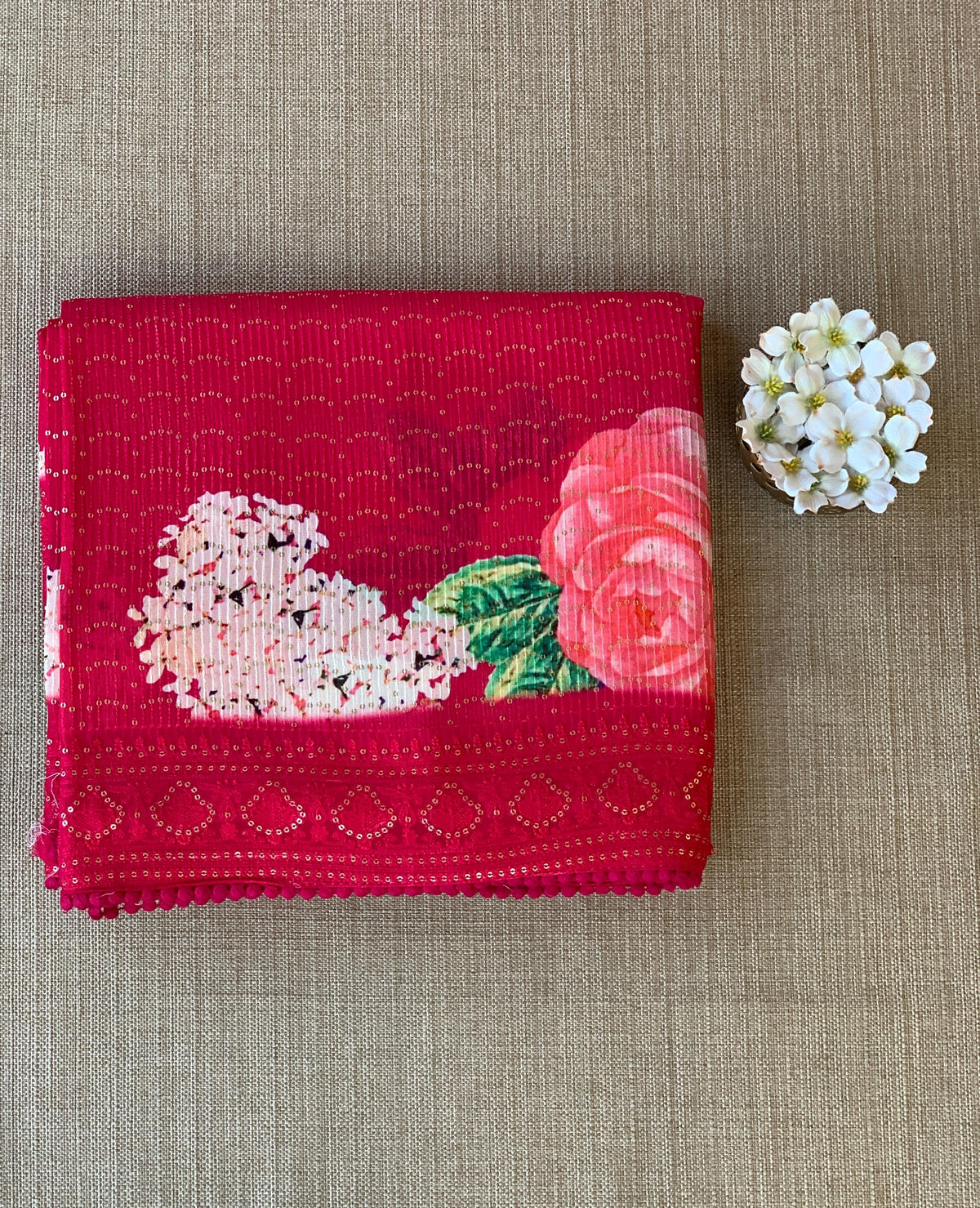 Reddish Pink georgette sequence saree with statement floral print