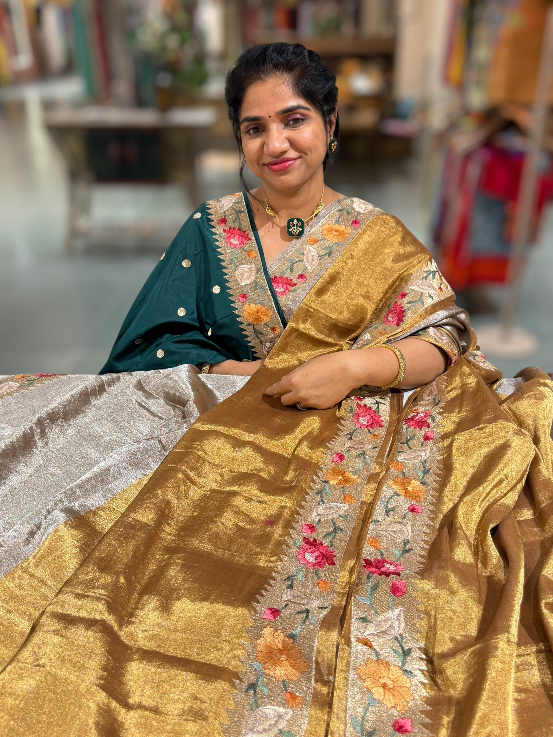 Handloom Tissue Saree with Paithani inspired embroidered border.