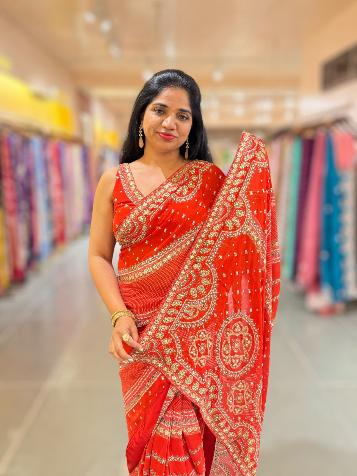 Orangish Red Kareena Inspired Gorgette Saree with allover mirrors