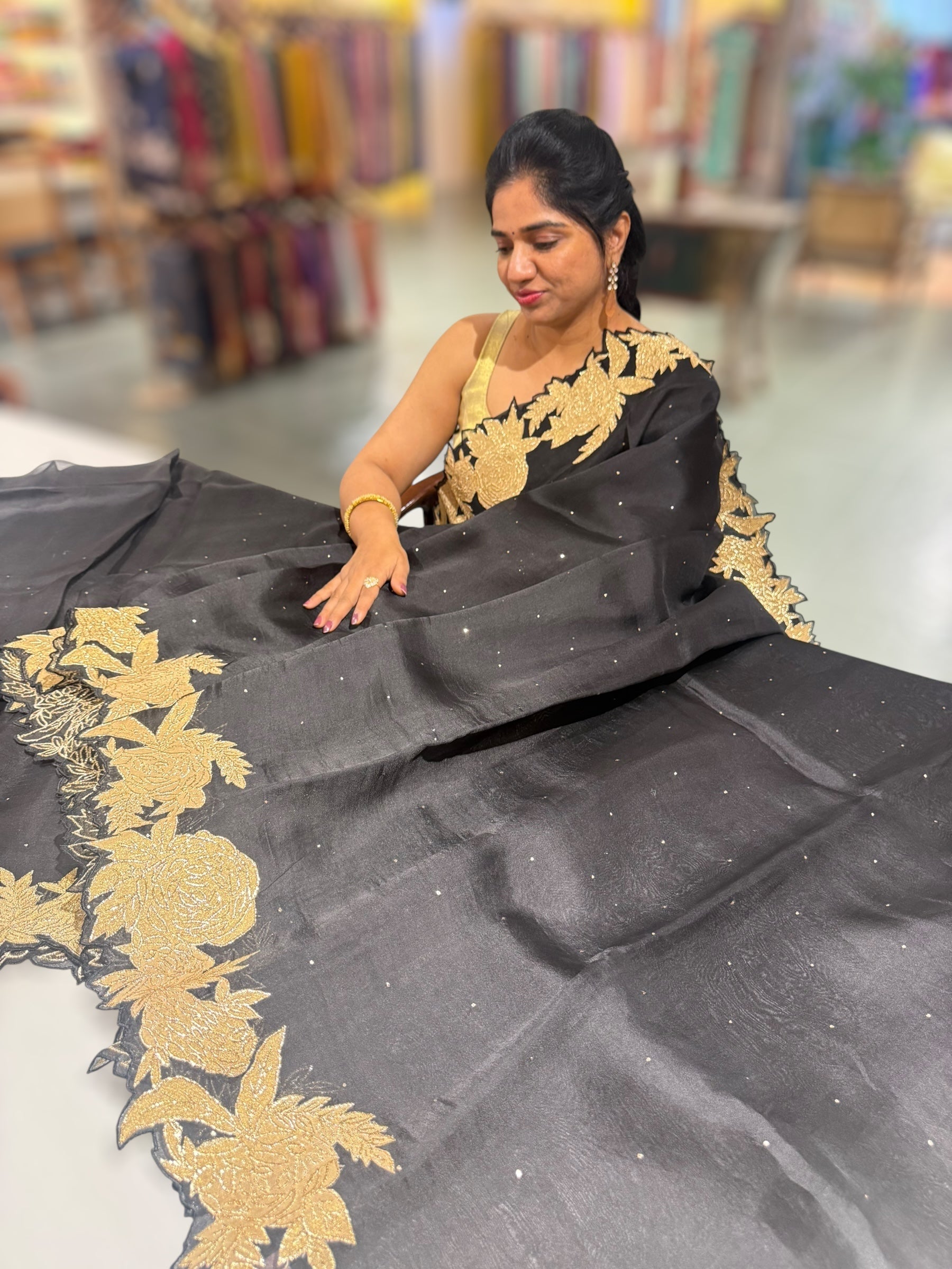 Black Organza Saree with Mukaish work and tissue floral applique cutwork border