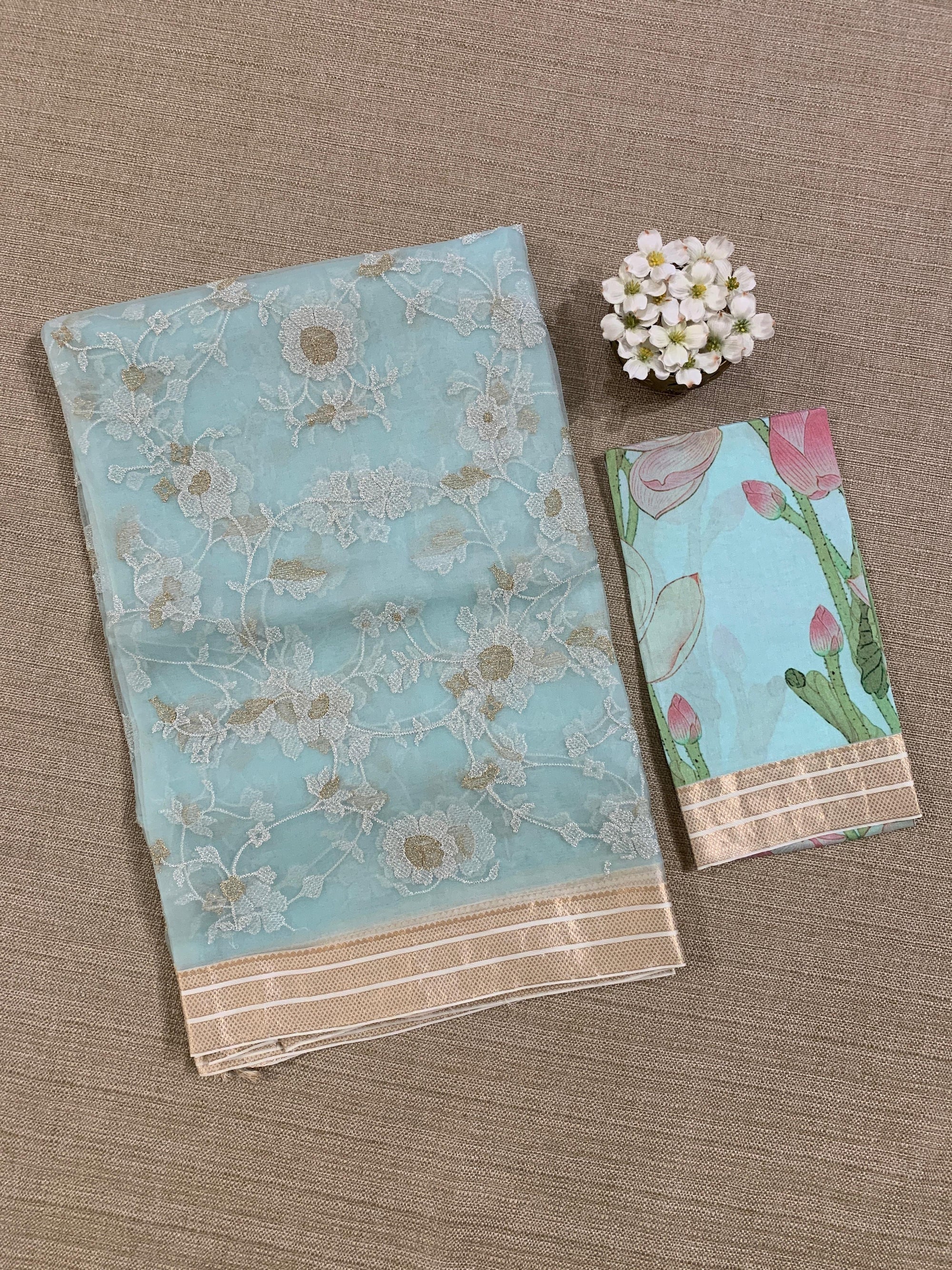 Baby Blue Muslin allover embroidered Saree with pichwai printed blosue