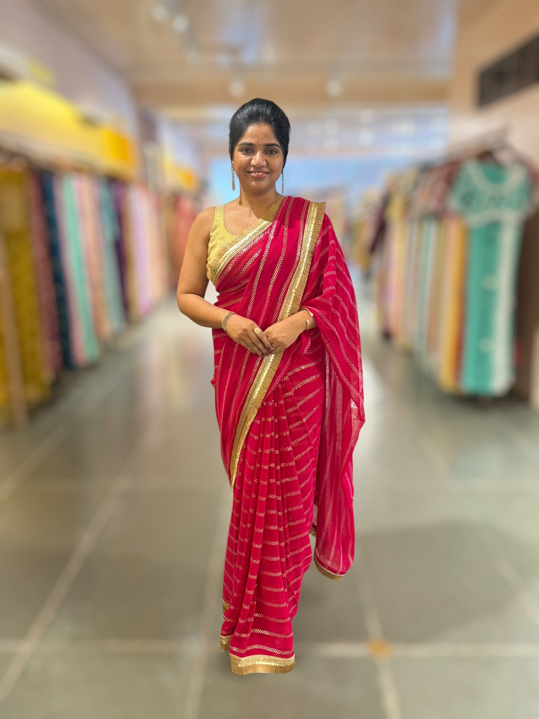 Dark Pink Georgette Saree with stick on Badla in stripes pattern and kiran Lace