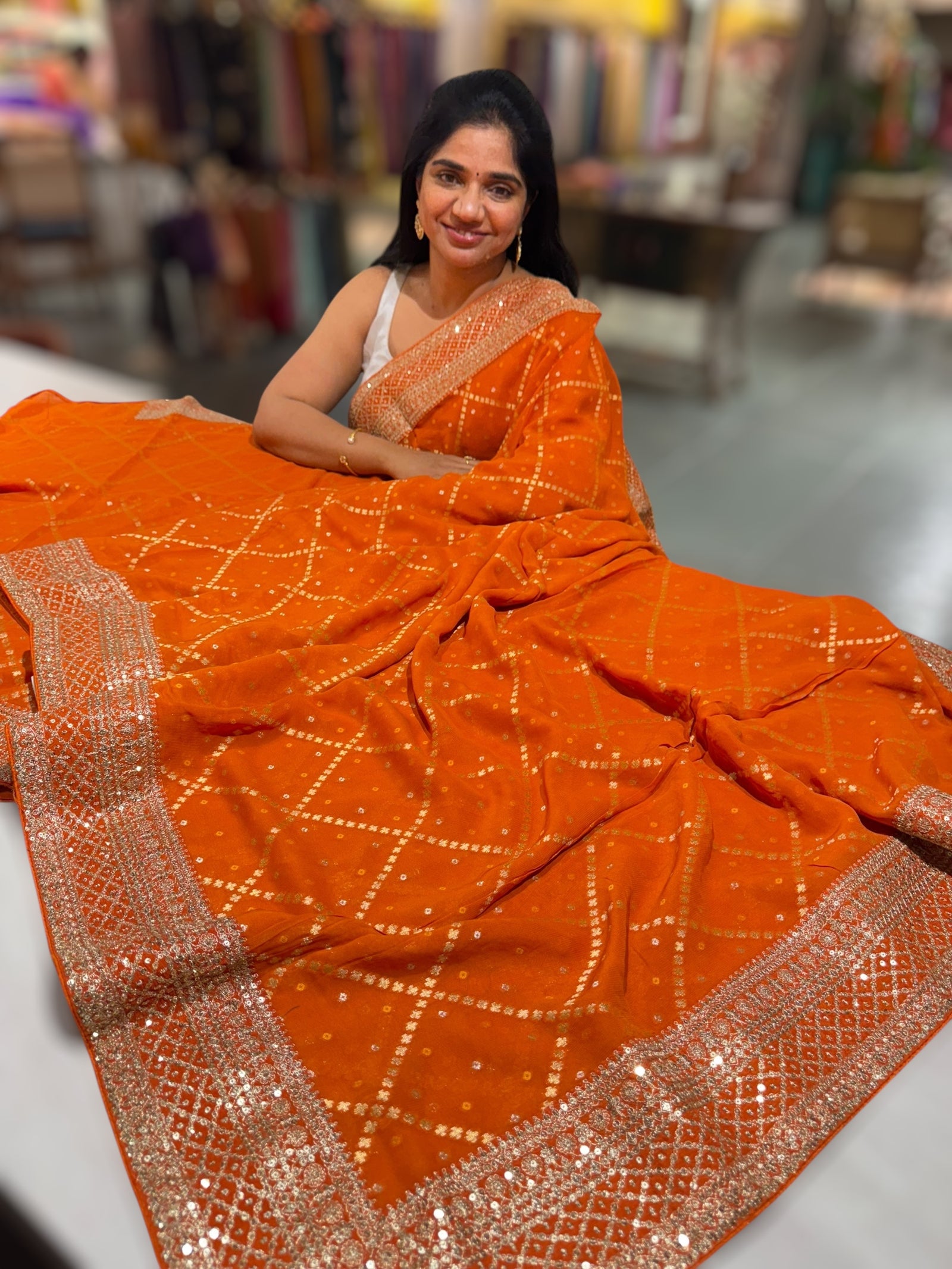 Orange Fancy Banarasi Bandhini georgette saree with sabhyasachi borders and blouse