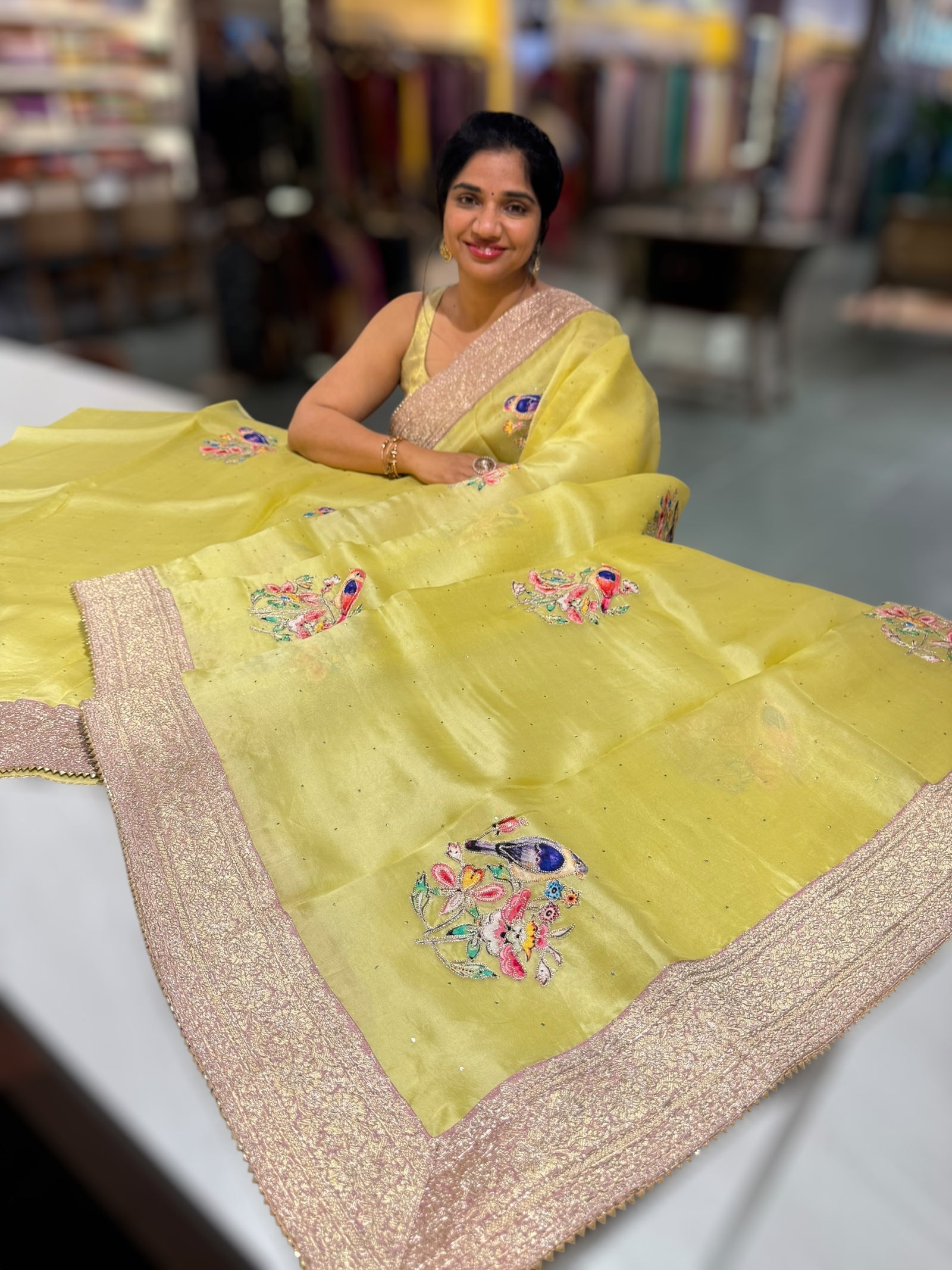 Lime yellow Pure Organza Saree with banarasi pitawork border and bird applique motifs allover the saree