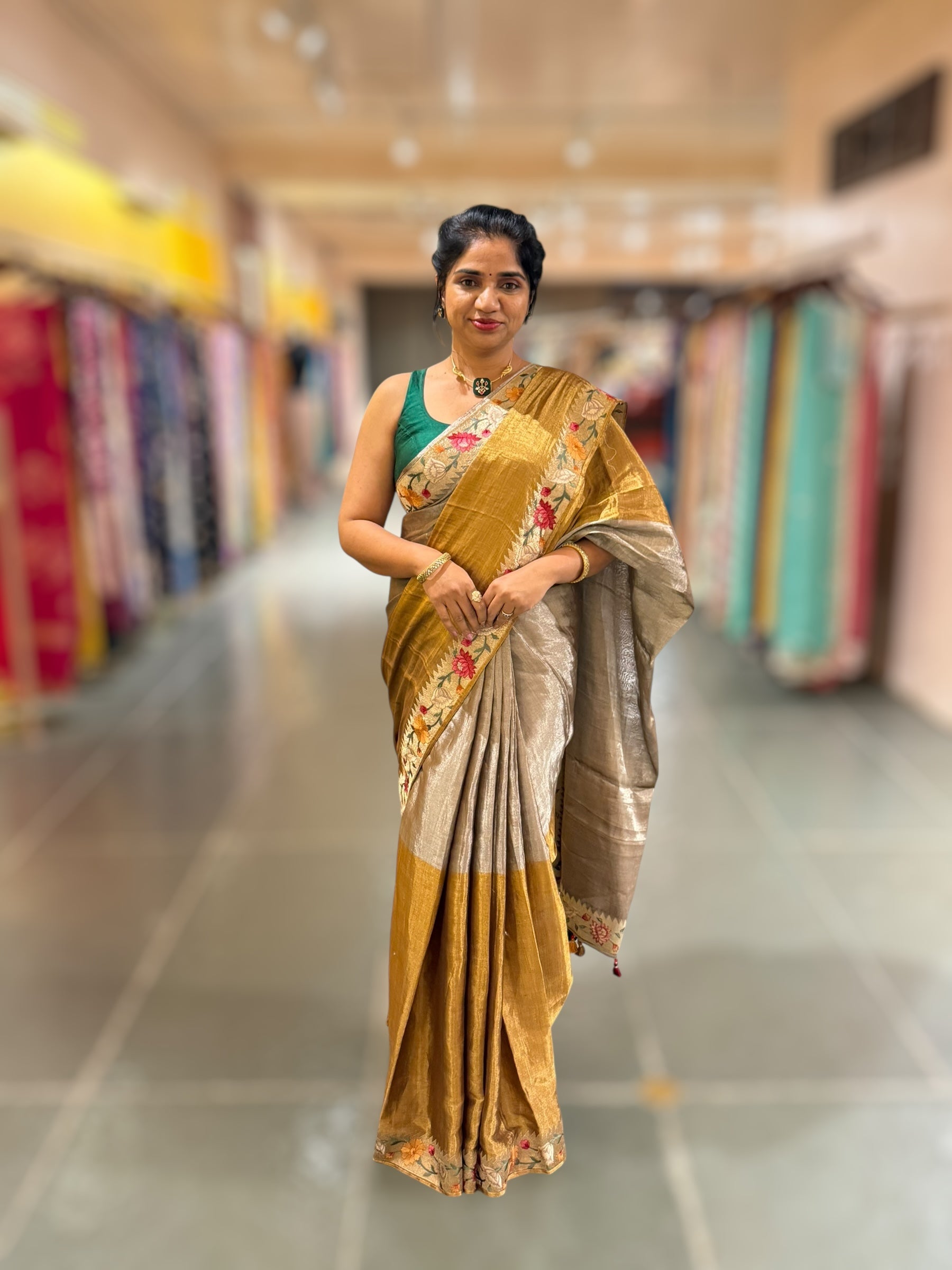 Handloom Tissue Saree with Paithani inspired embroidered border.