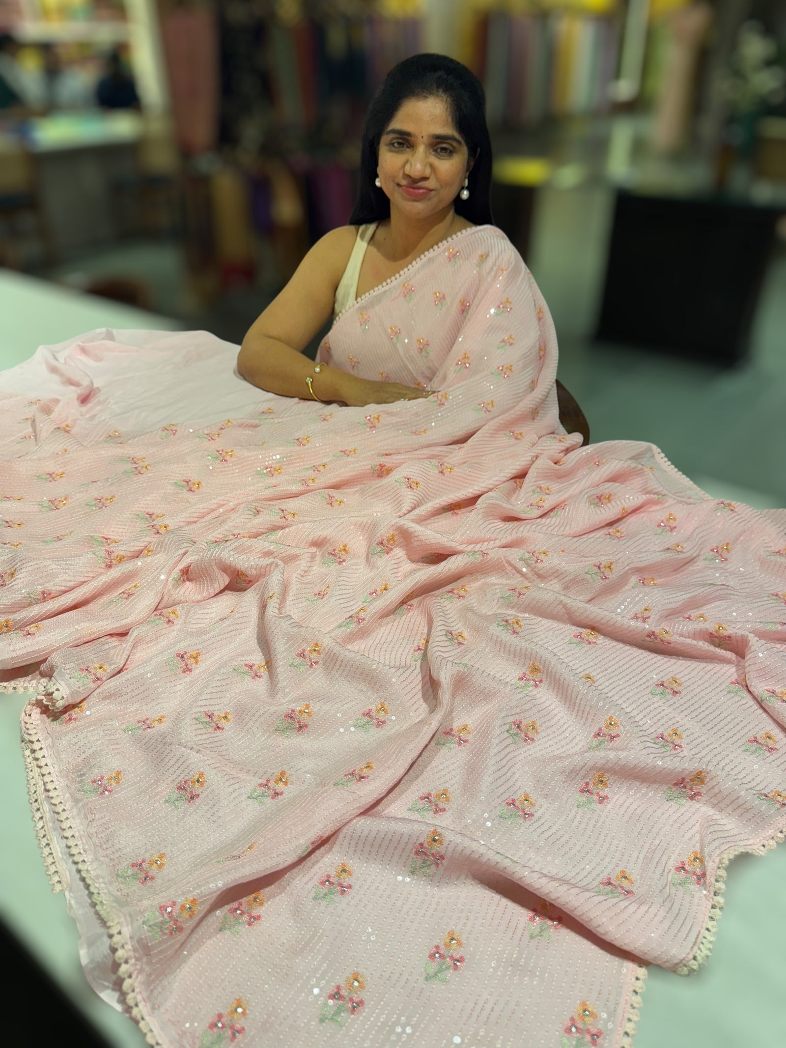 Baby pink chiffon saree with embroidery