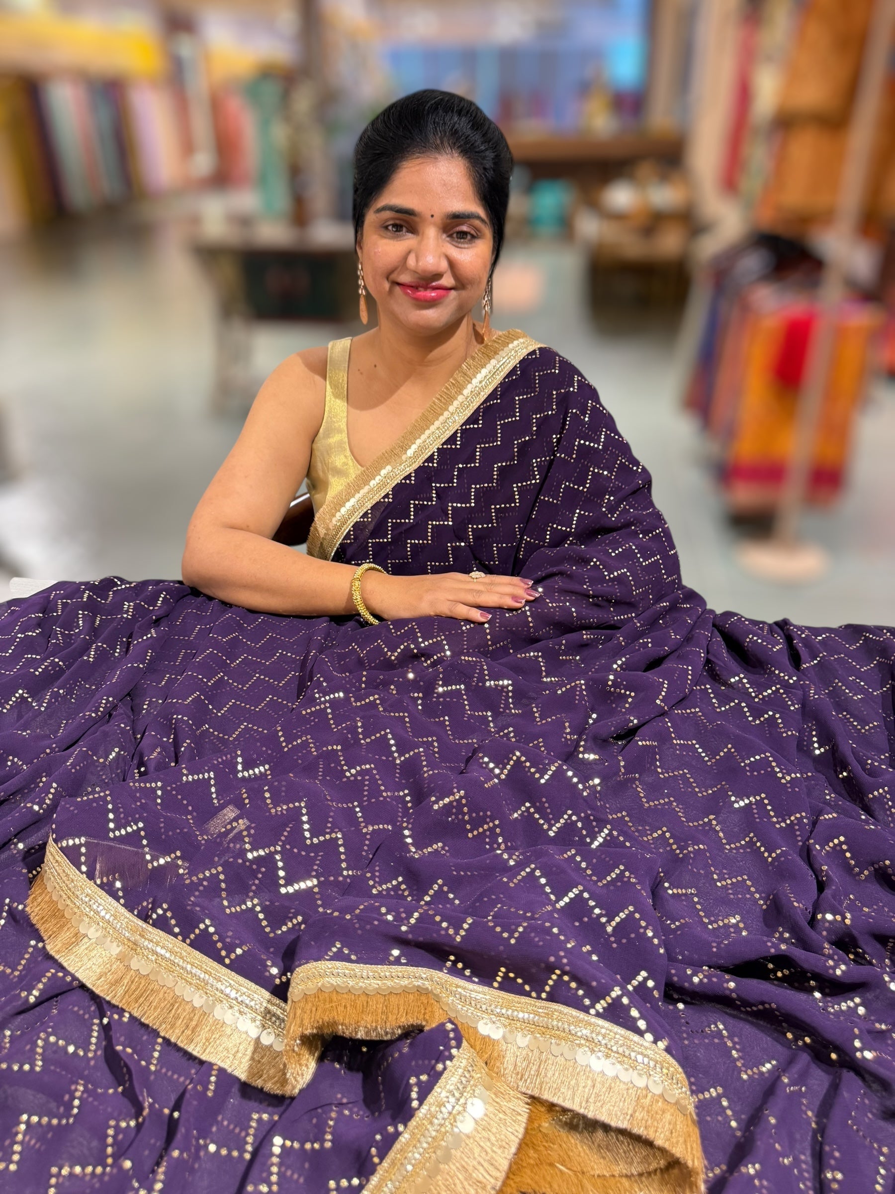 Dark Violet Georgette Saree with stick on Badla in zigzag pattern