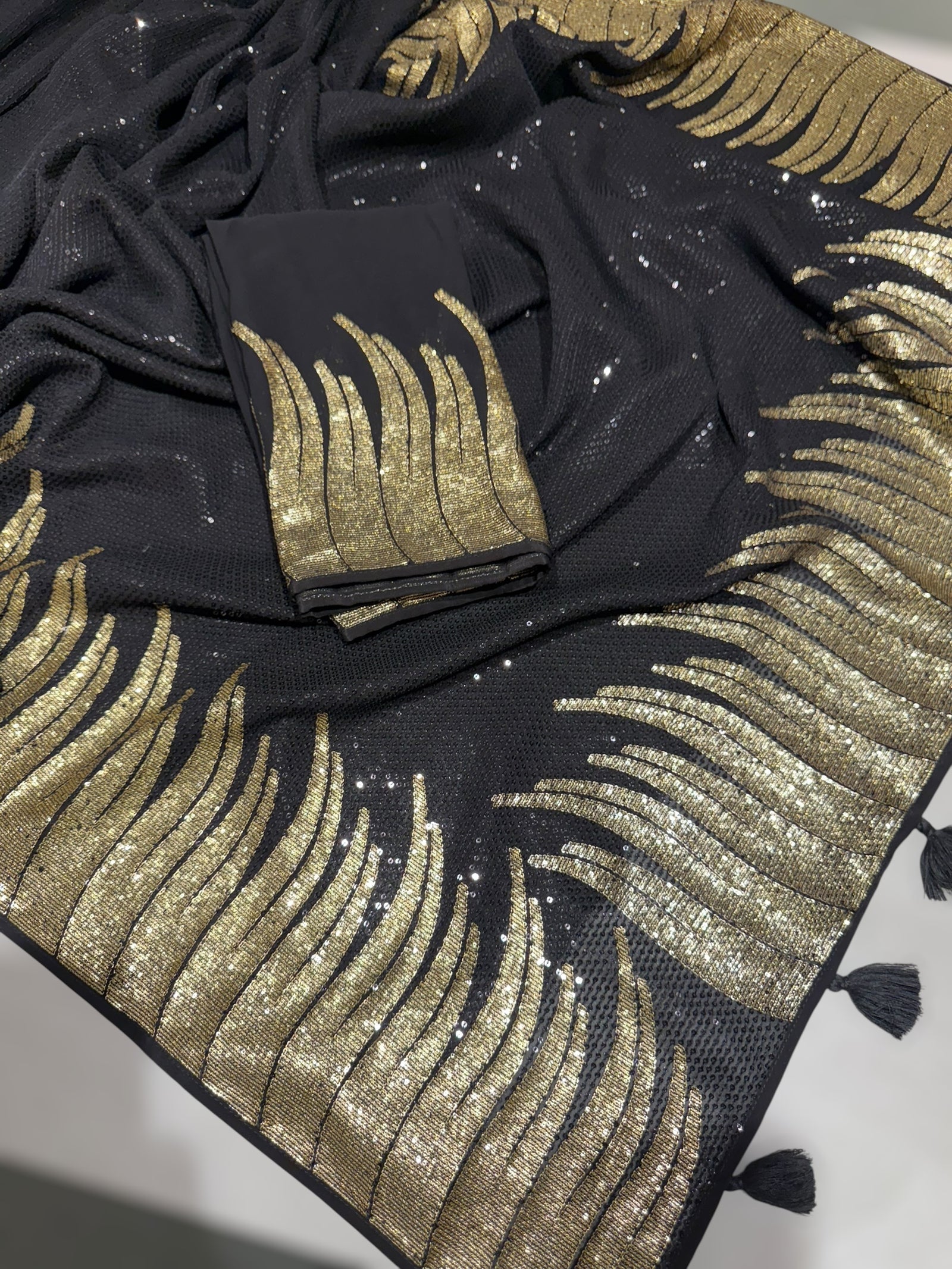 Black Georgette Saree with stunning Gold embroidered Border