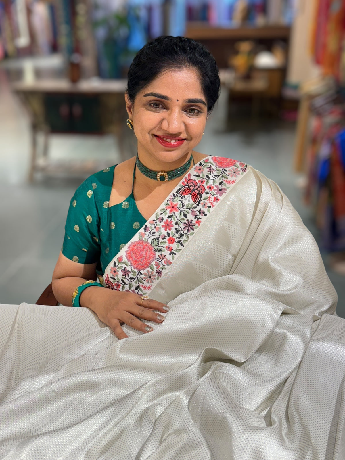 Half White Banarasi  brocade Silk Saree with Petite Point Embroidered Border.