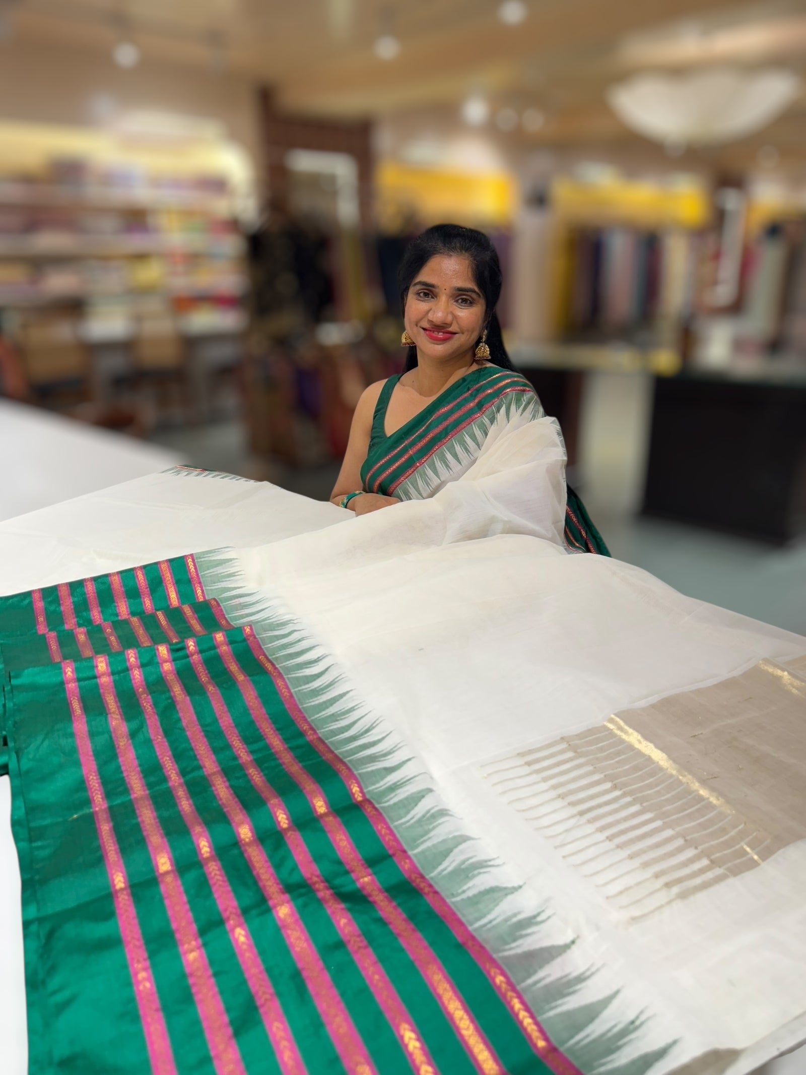 Half white Ponduru Khadi Saree in 80’s Count with Kanchi Style Emerald Green borders