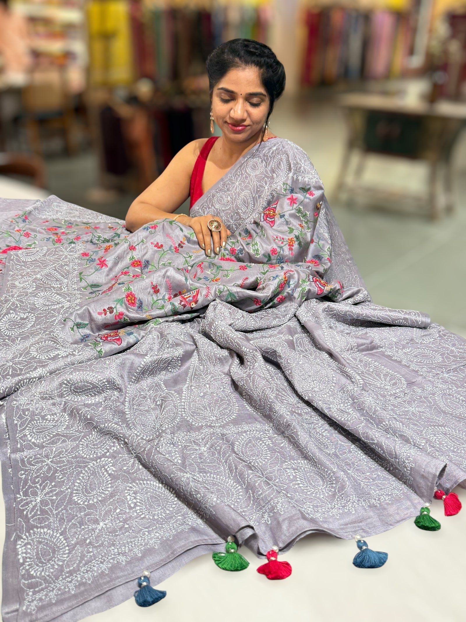 Lilac undertone tussar Saree with lucknowi border and pallu with allover petite point embroidery.