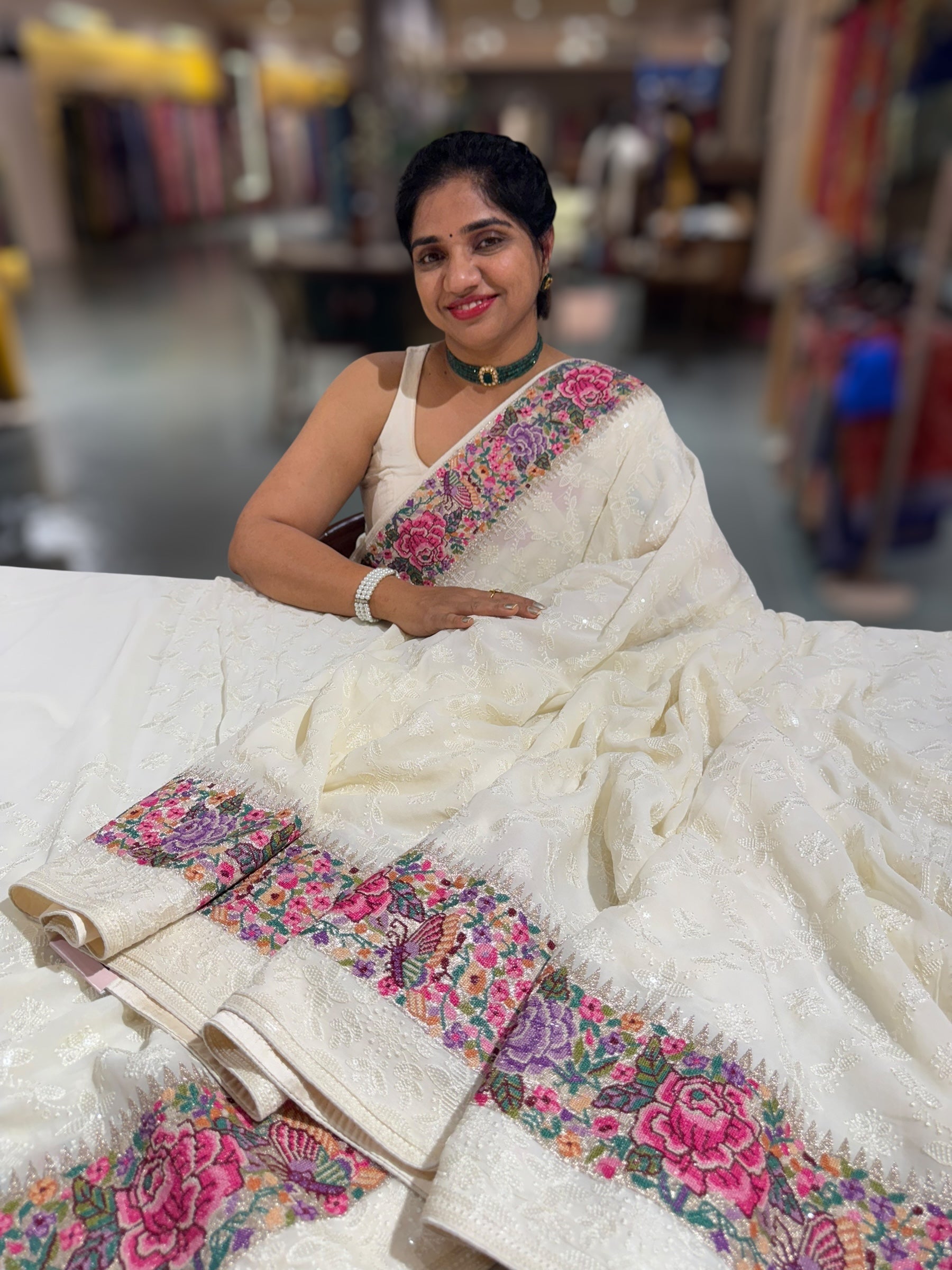 Halfwhite Georgette Saree with allover Chikankari Embroidery and Petite Point border