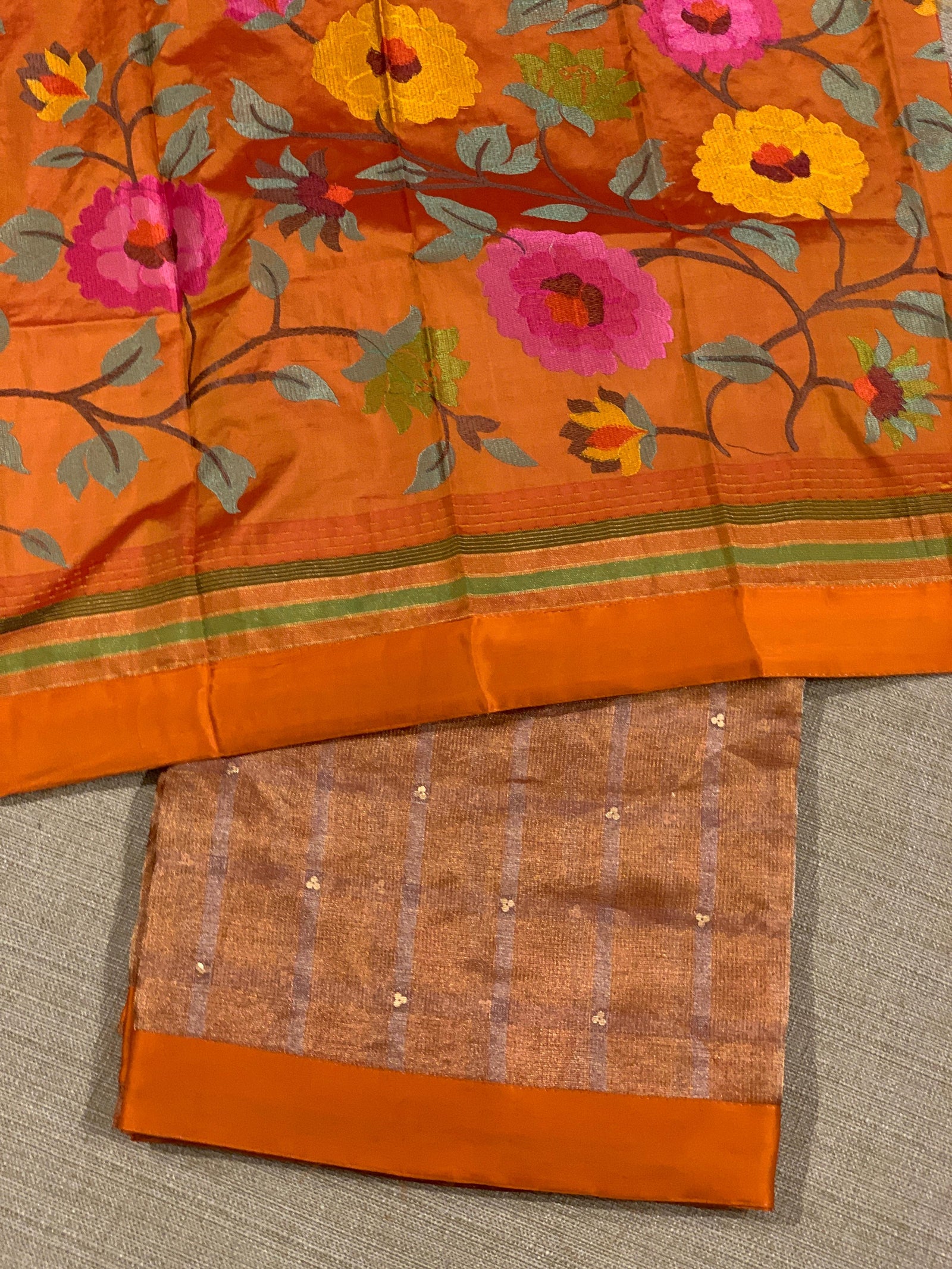 Orange Tissue saree with kanchi silk embroidered blouse
