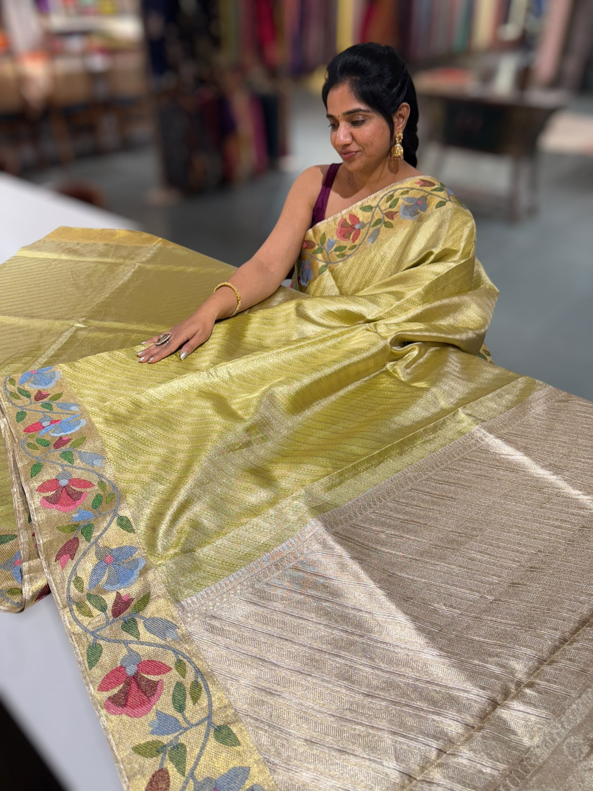 Apple Green Kanchi Tissue Brocade Saree With jamdani inspired embroidery.