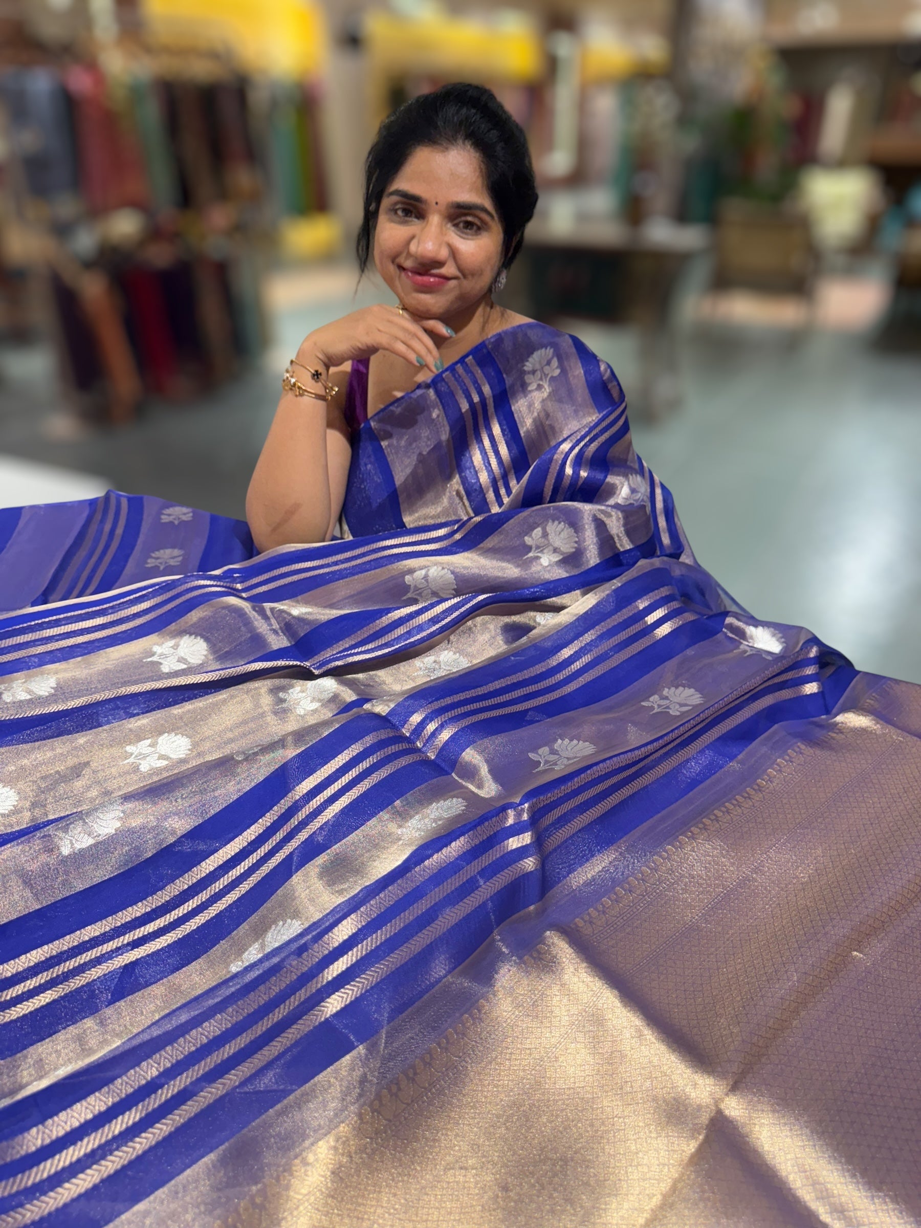 Royal Blue Banarasi Handloom Kora Tissue Stripes with allover kaduwa woven lotus  motifs .