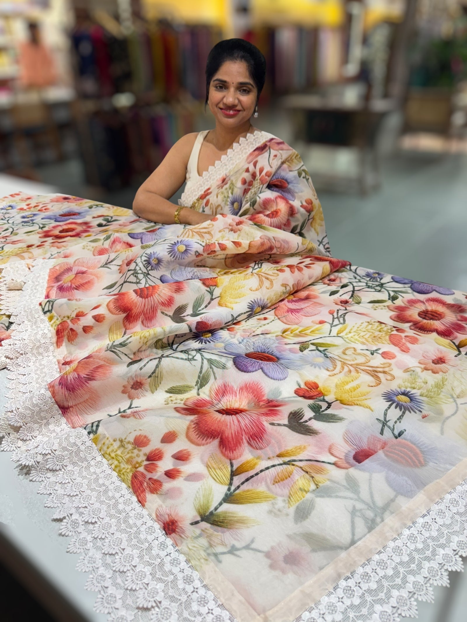 Ivory Organza 3D floral Printed Saree hemlined with crotia lace
