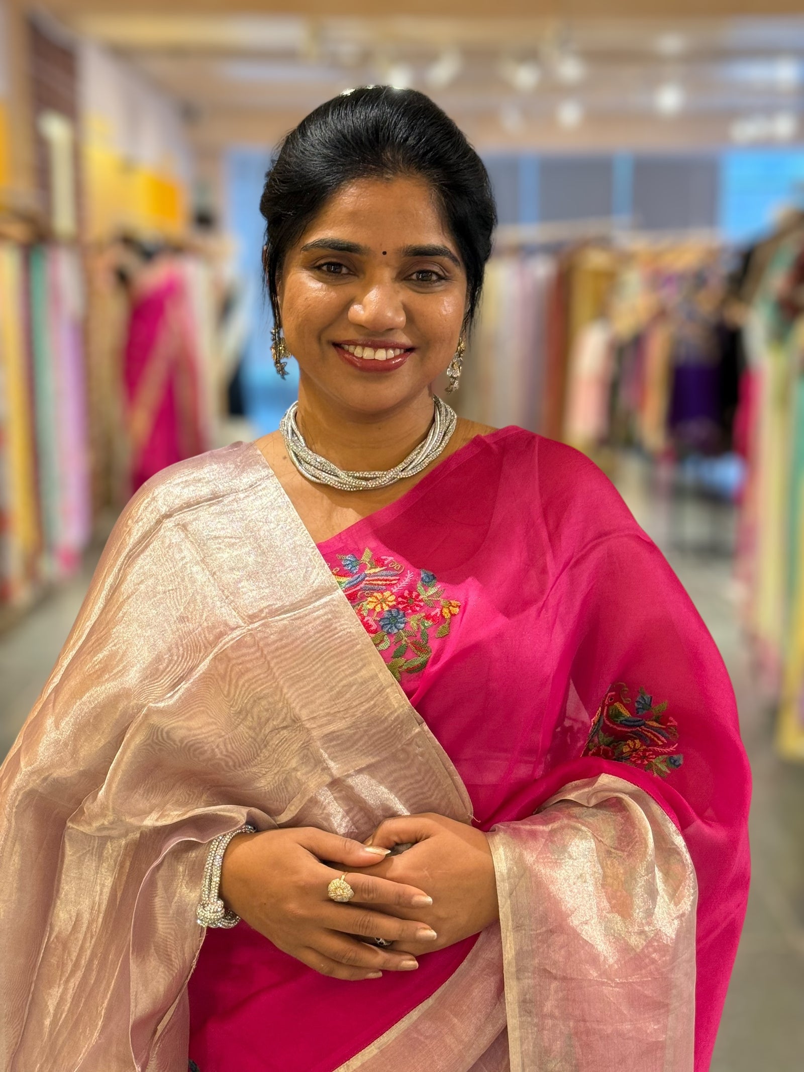 Rani Pink Organza Saree with pure Tissue Border