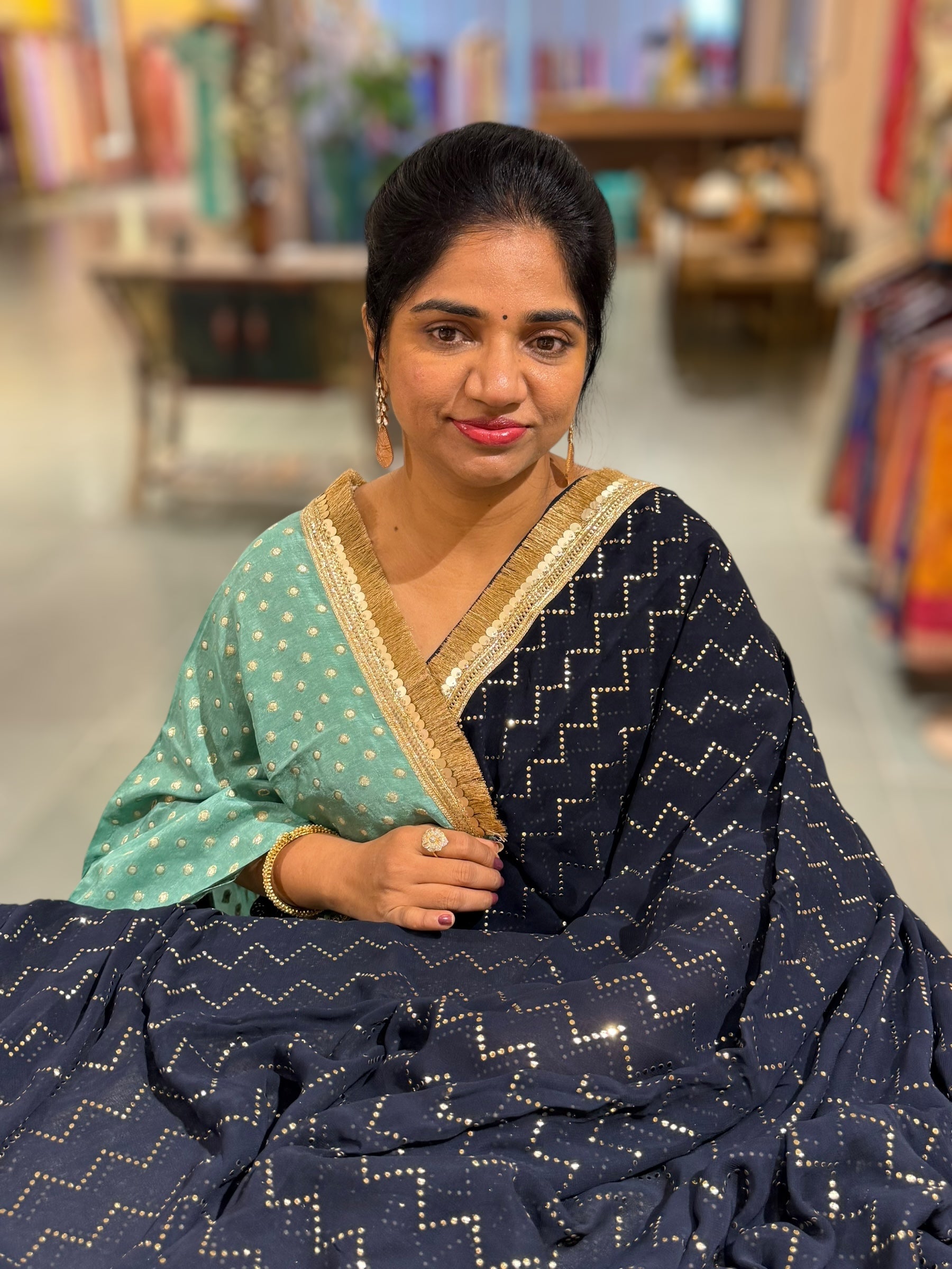 Navy Georgette Saree with stick on Badla in zigzag pattern