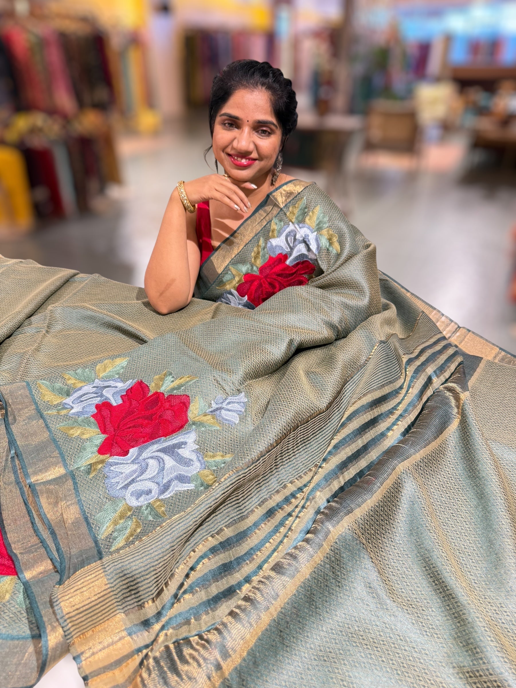 Sage Green Tussar Brocade Saree With Statement Red Rose Embroidery.