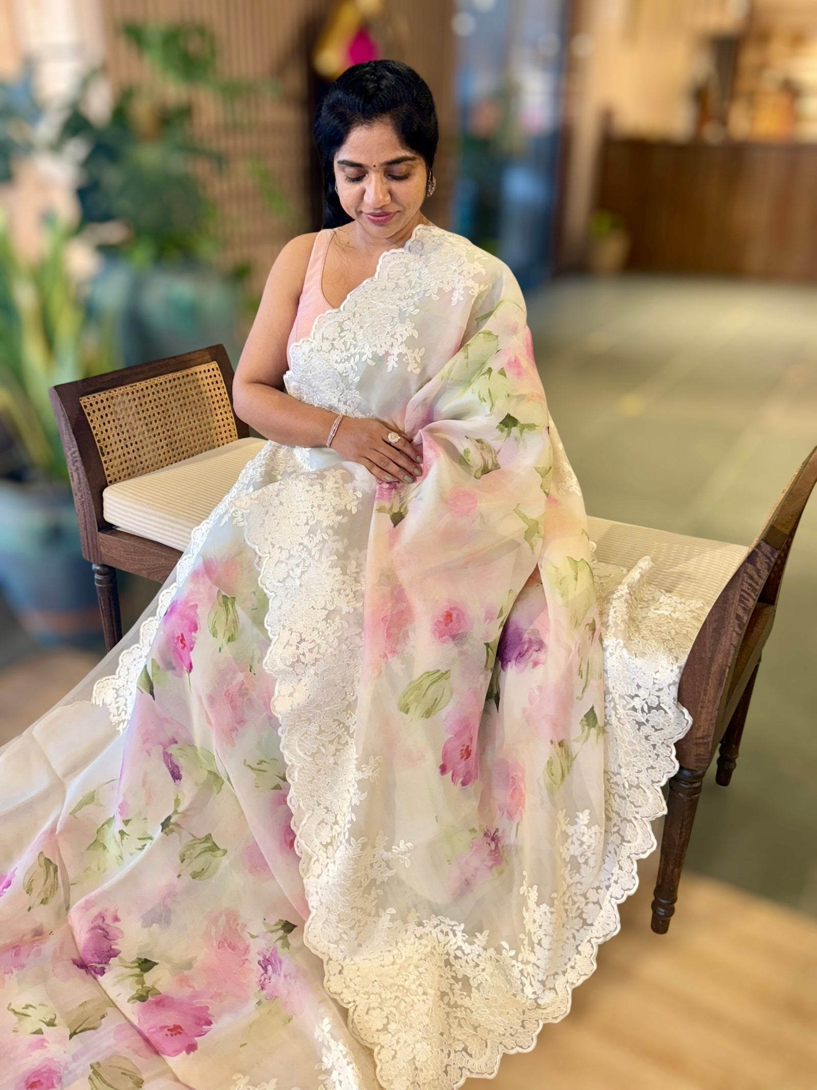Ivory Printed Organza Saree With Chantilly Lace Style Embroidered Border.