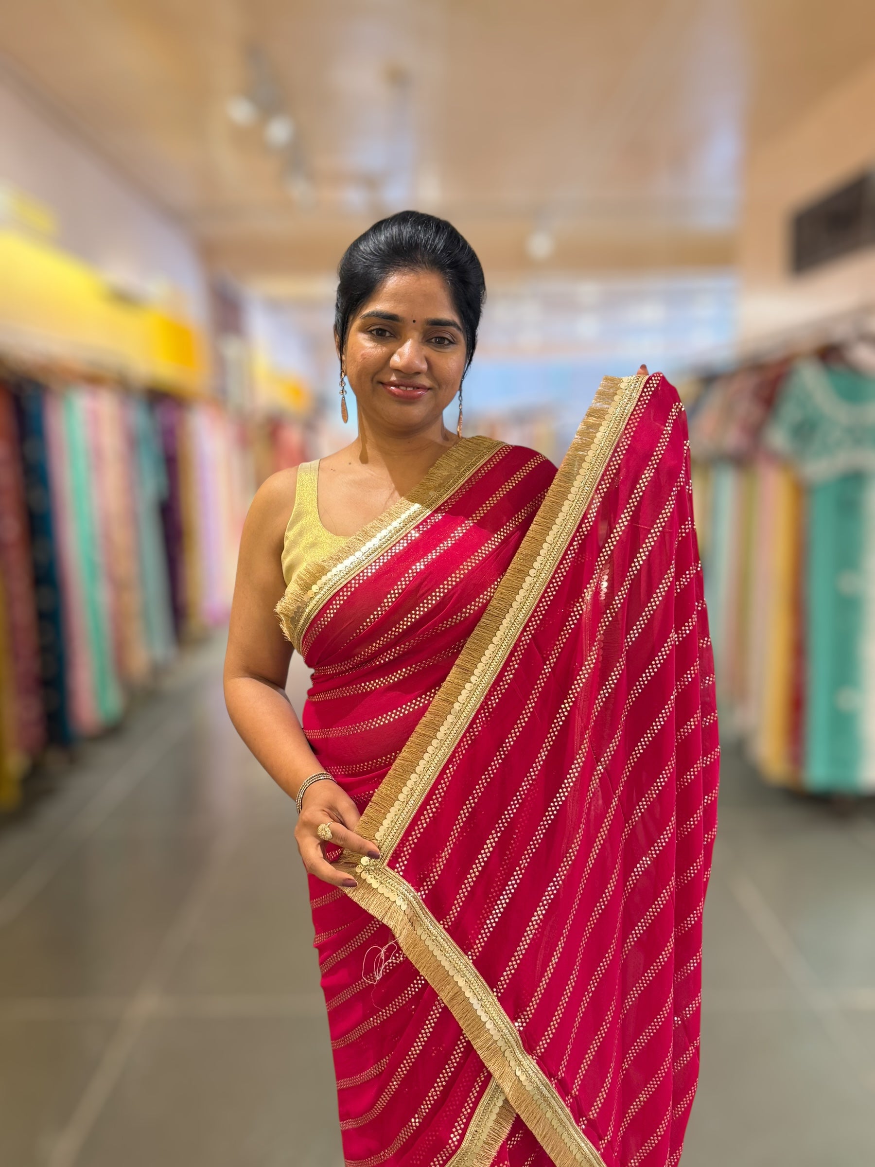Dark Pink Georgette Saree with stick on Badla in stripes pattern and kiran Lace