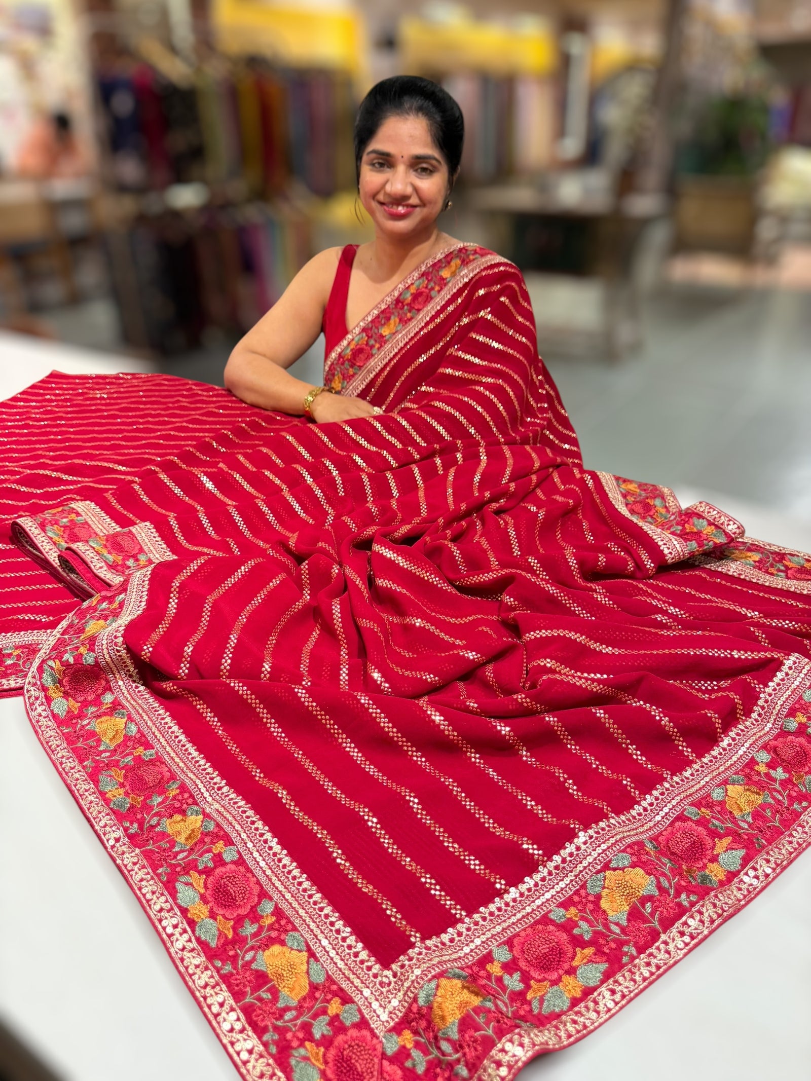 Red Georgette Saree with stick on badla with Sabyasachi borders and blouse