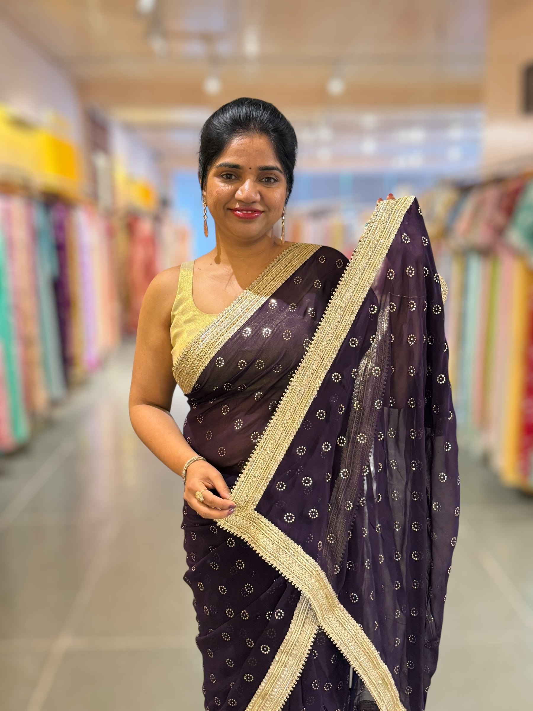 Violet Georgette Saree with stick on Badla in flower pattern