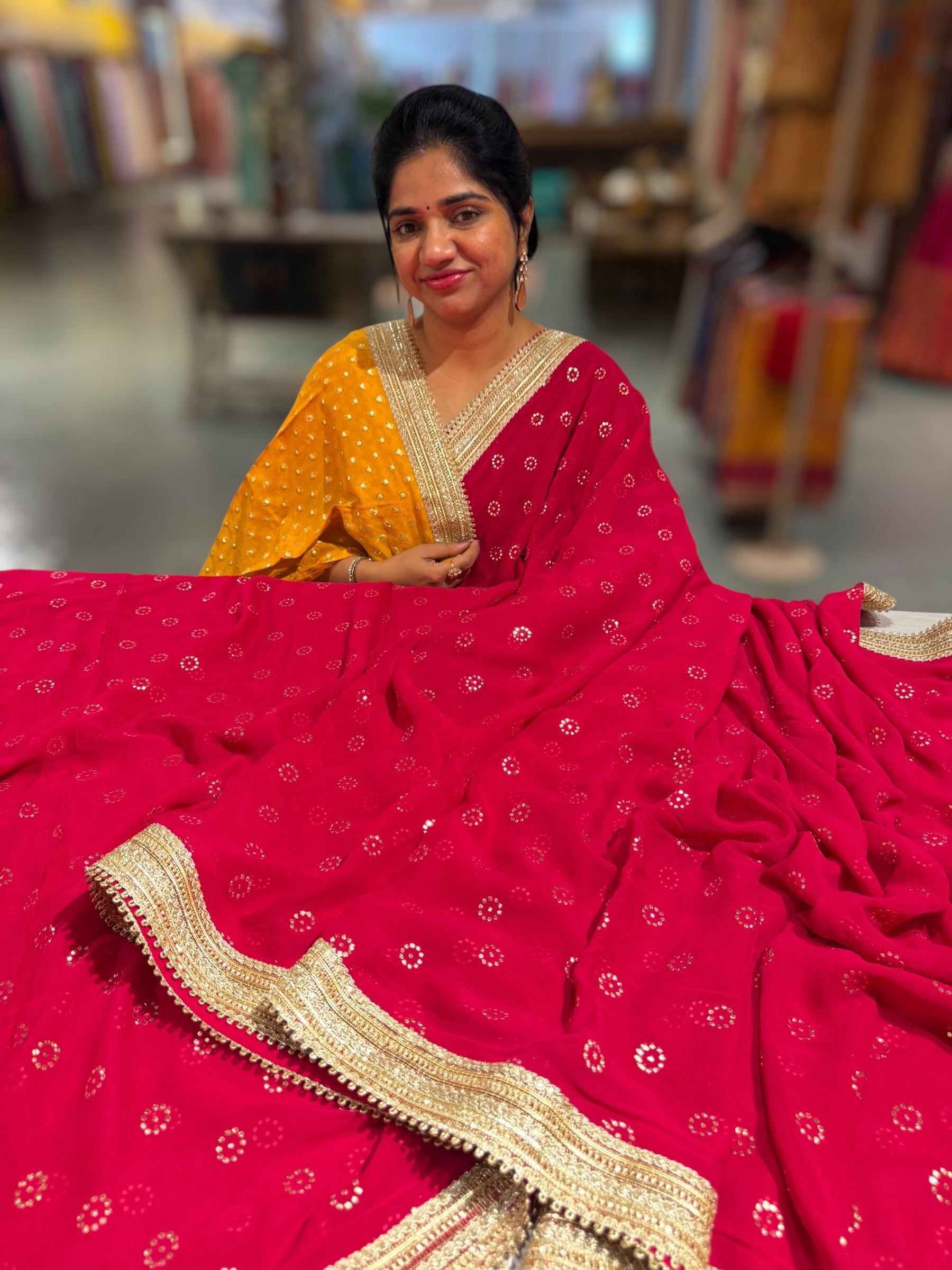 Dark Pink Georgette Saree with stick on Badla in flower pattern
