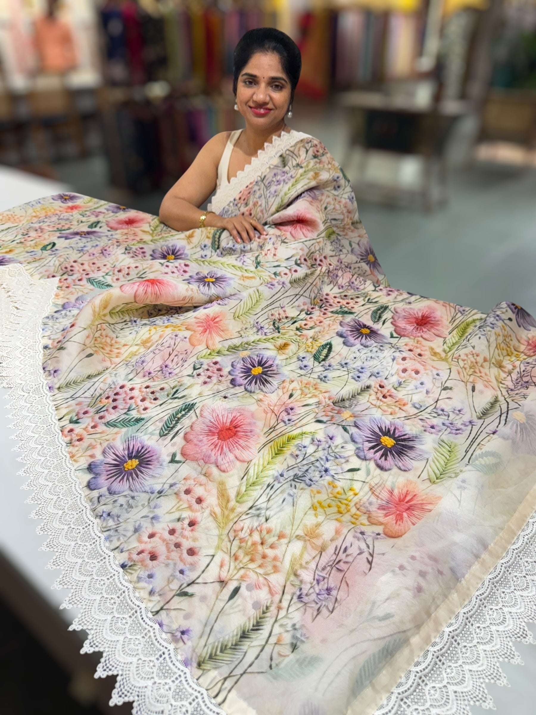 Ivory Organza 3D floral Printed Saree hemlined with crotia lace