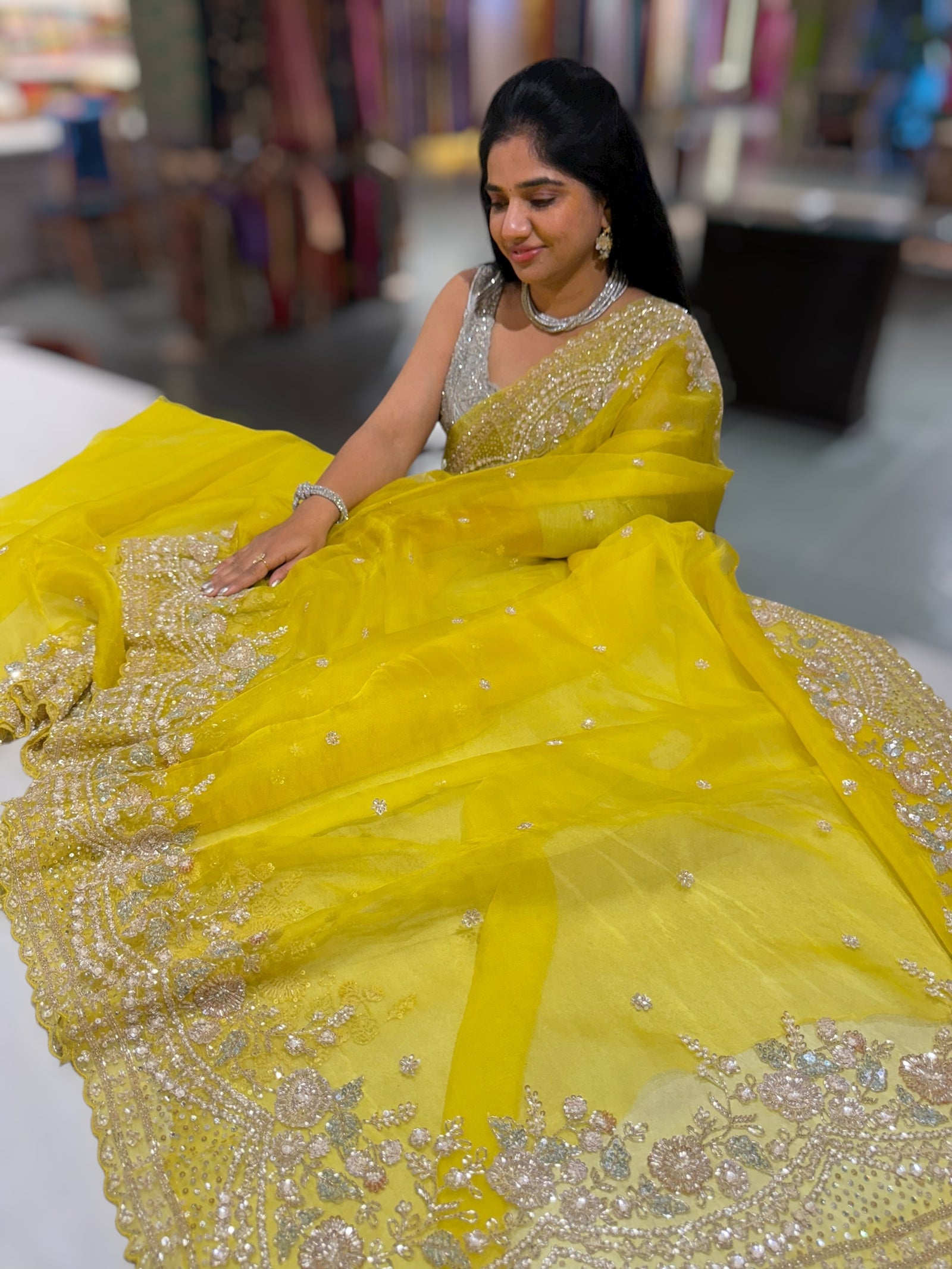 Lemon Yellow Organza Silk Saree with heavy intricate handwork