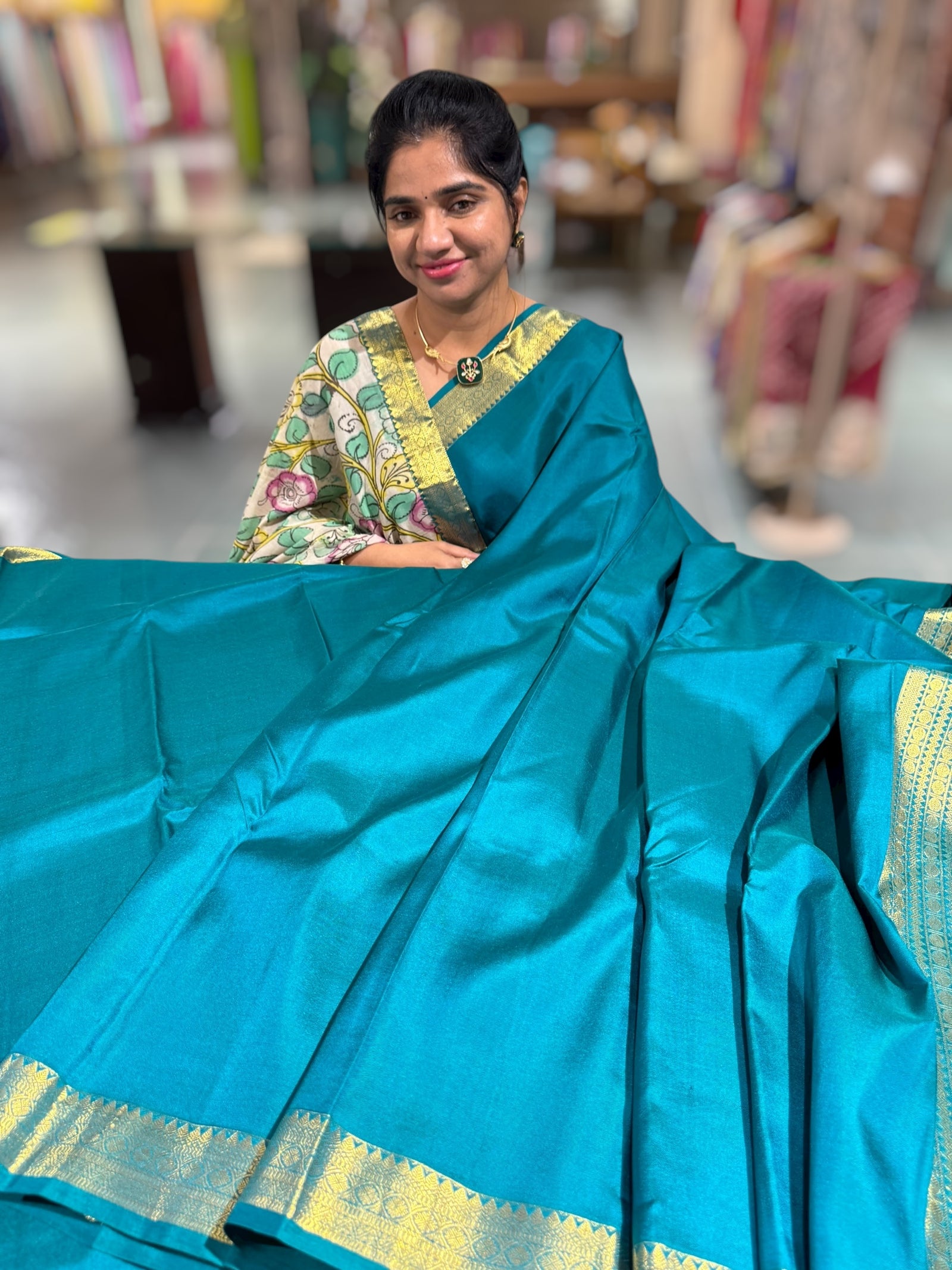 Peacock Green vintage Kanchipuram silk saree with pen kalamkari blouse