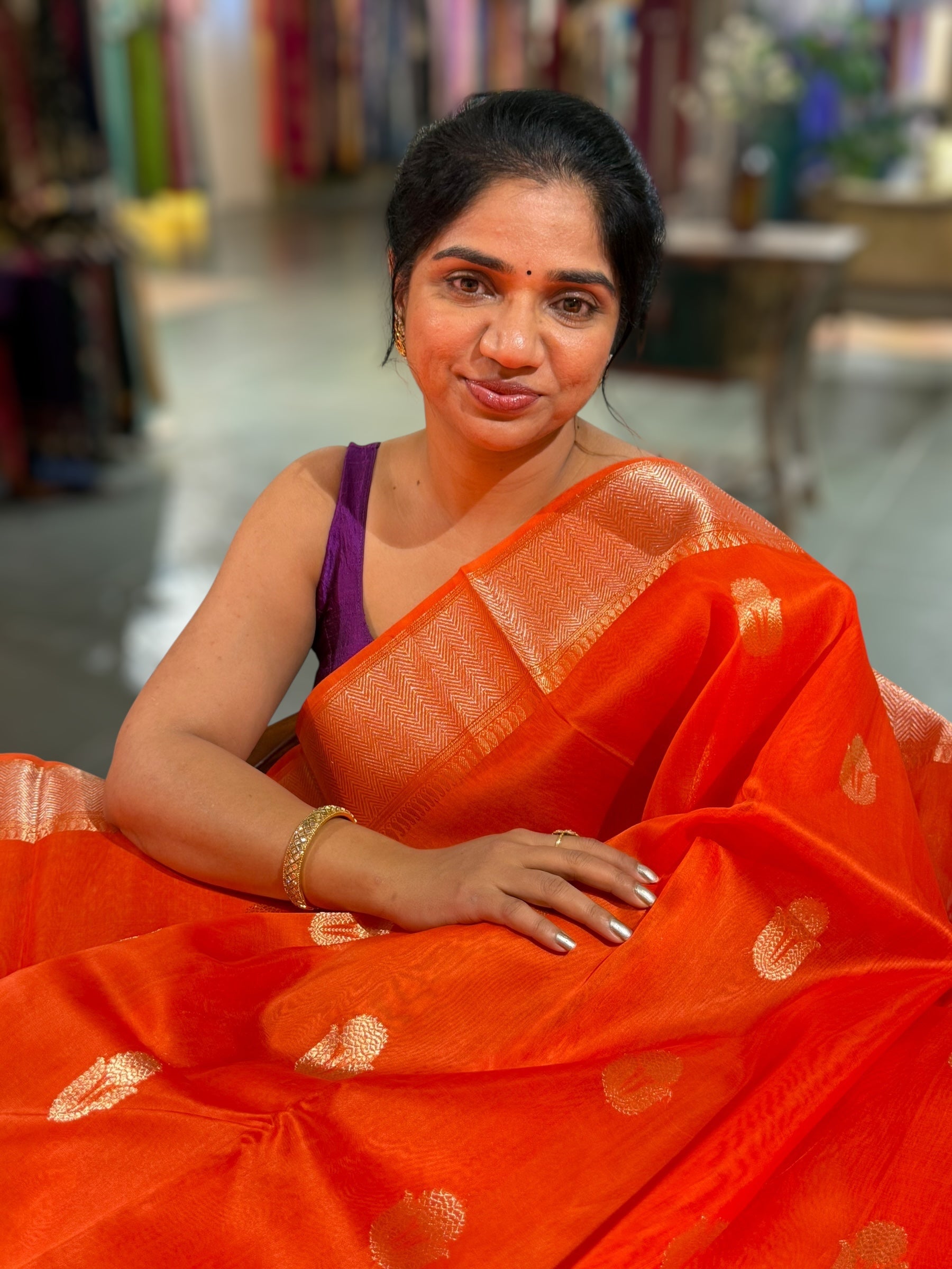 Orange Premium Kora Banarasi Saree with heavy weaving borders and Raw mango style motifs