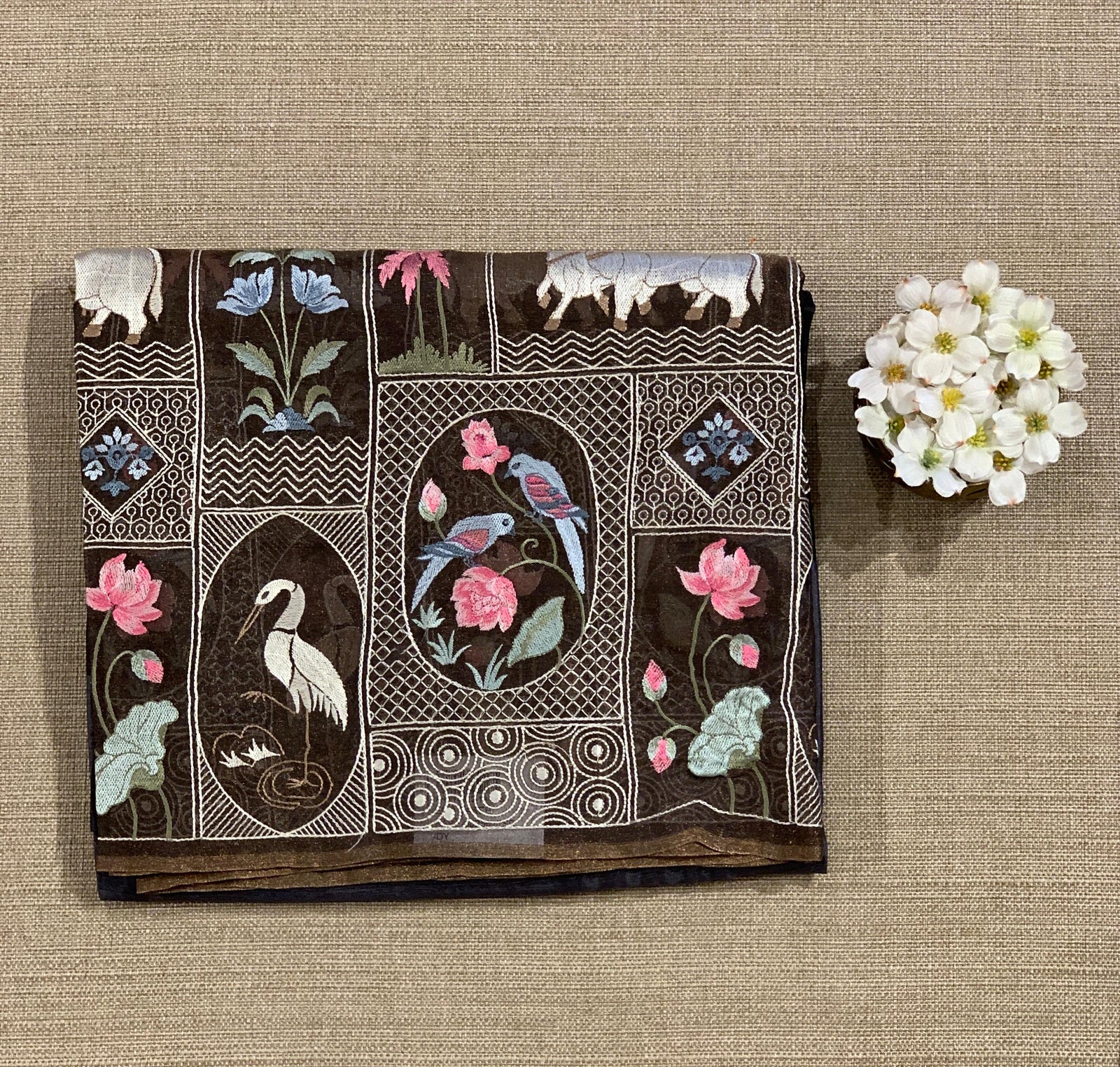 Black Kora-Tussar blend Handloom Saree with Tissue embroidered Skirt Border